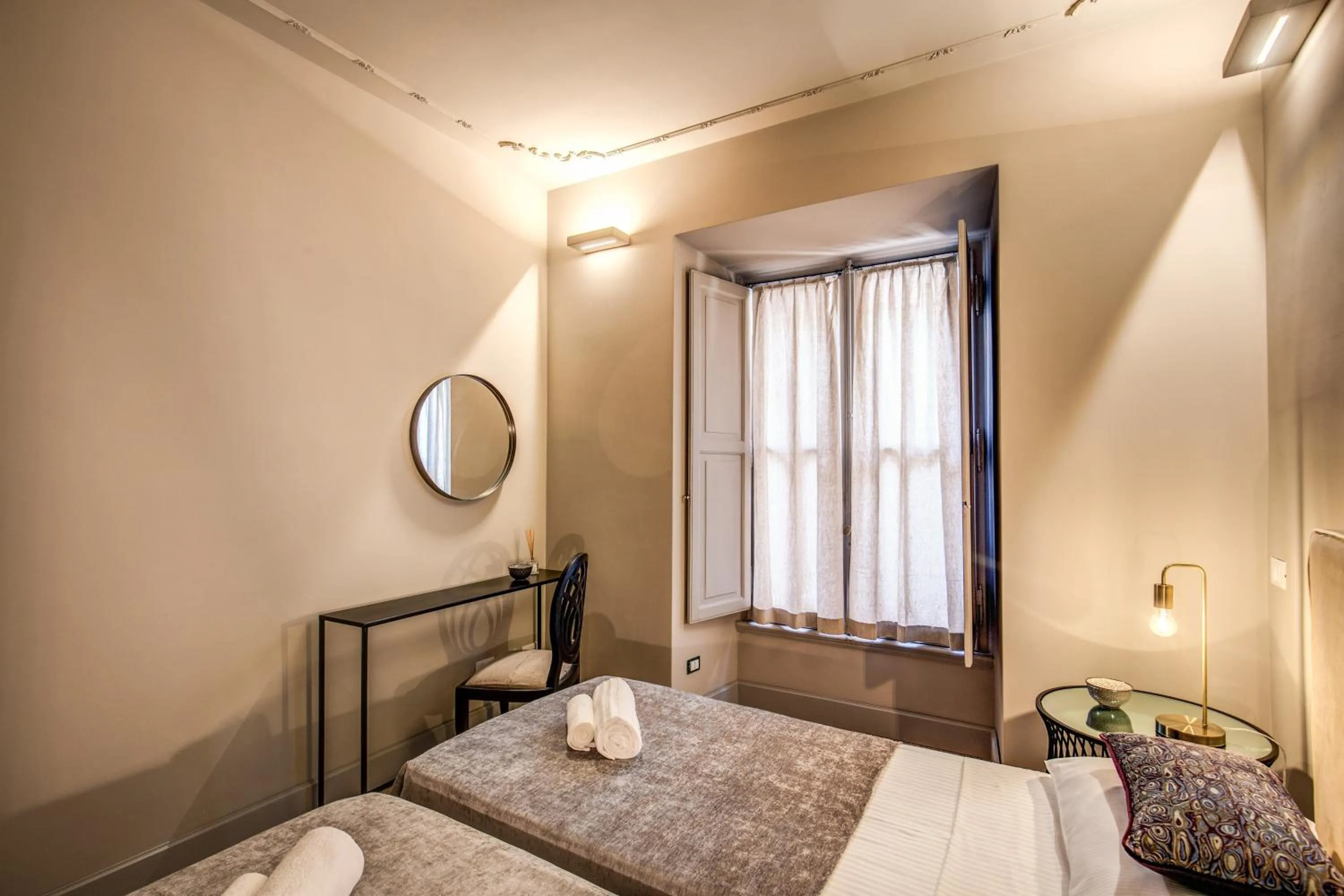 Bed in DeCharme apartment with terrace in Monti