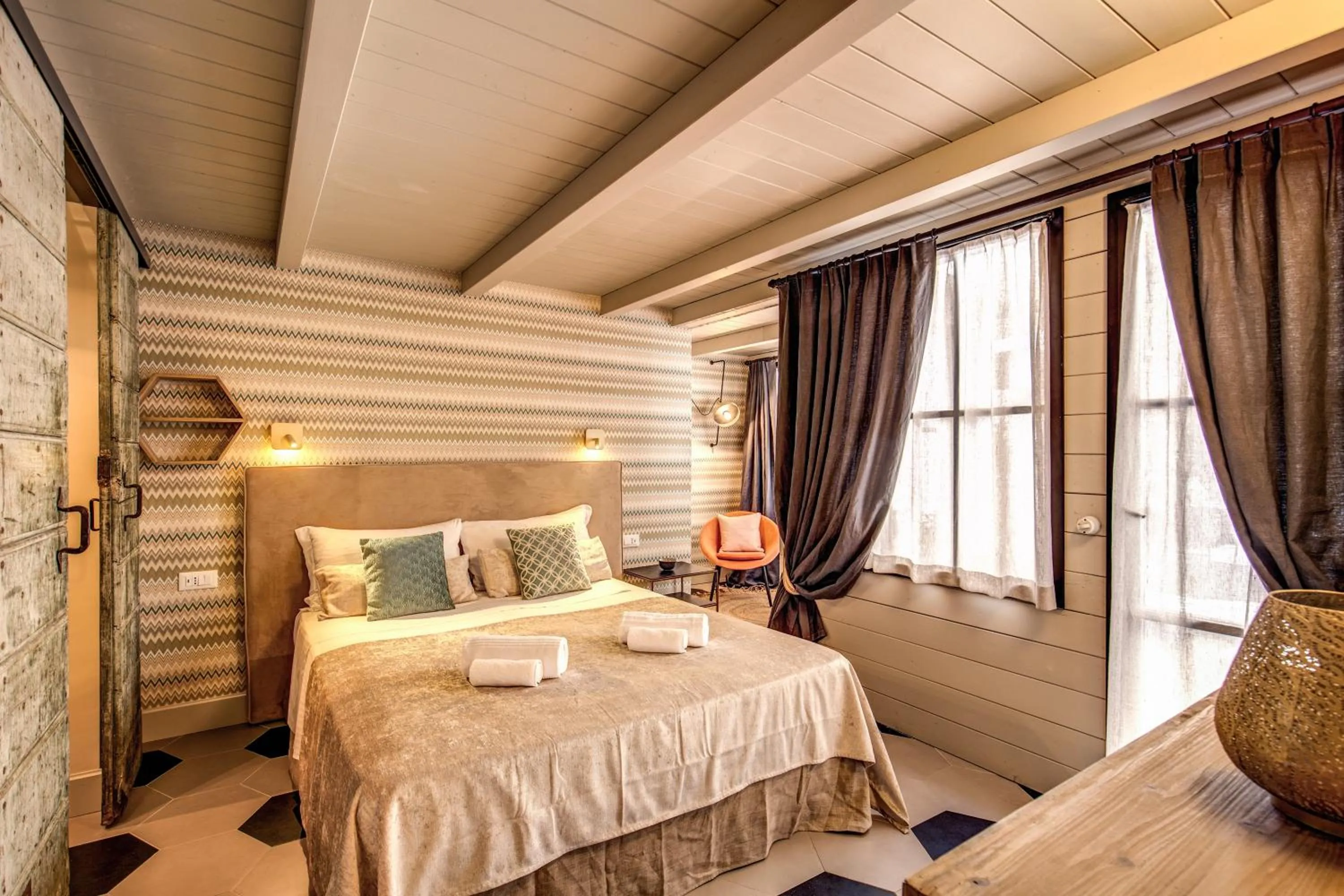 Bed in DeCharme apartment with terrace in Monti
