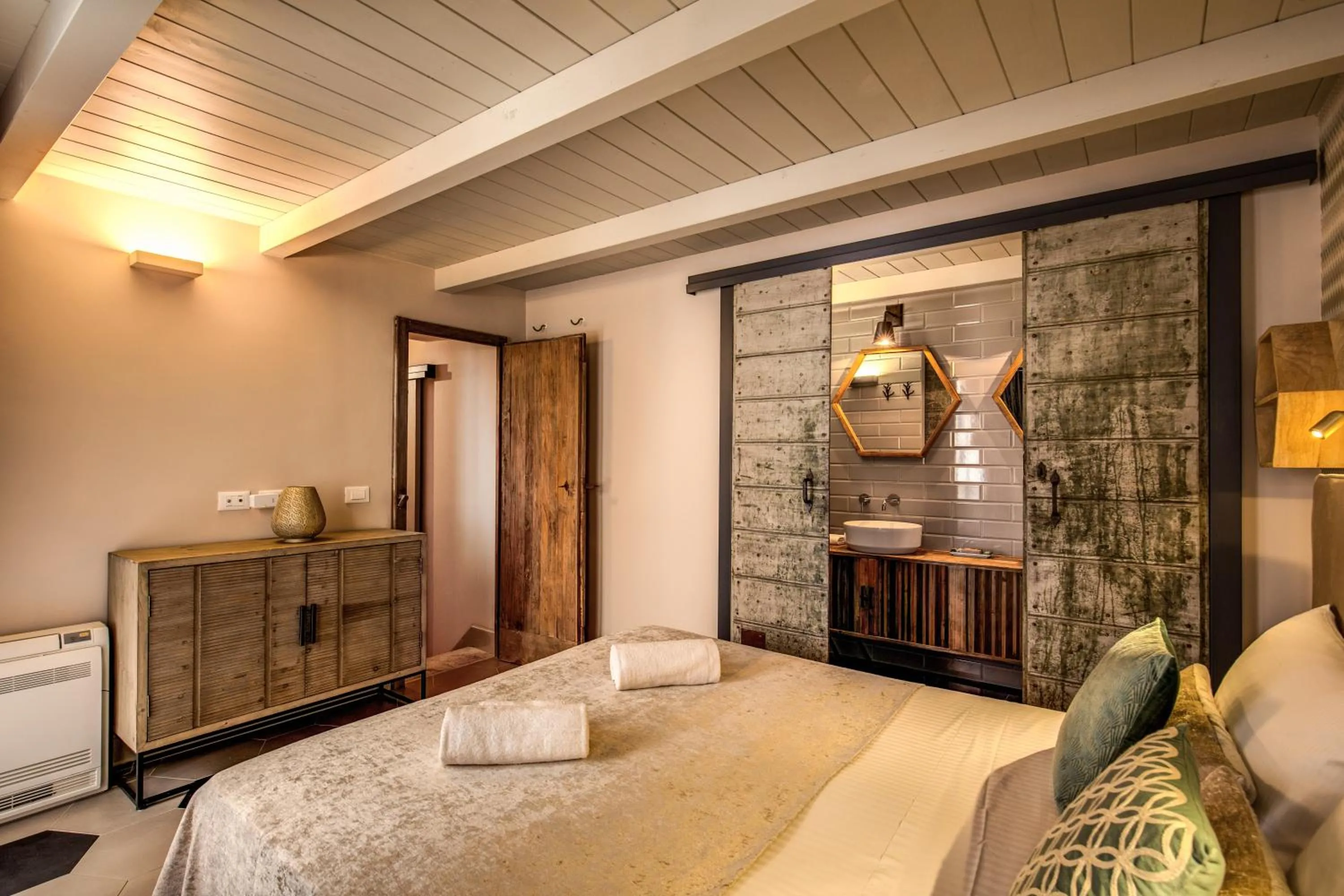 Bed in DeCharme apartment with terrace in Monti