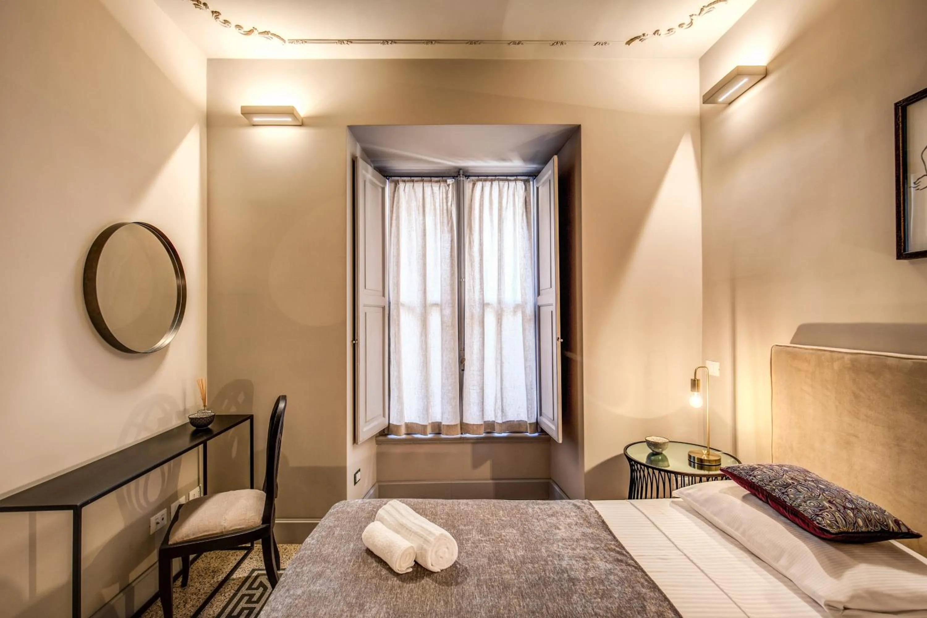 Bed in DeCharme apartment with terrace in Monti