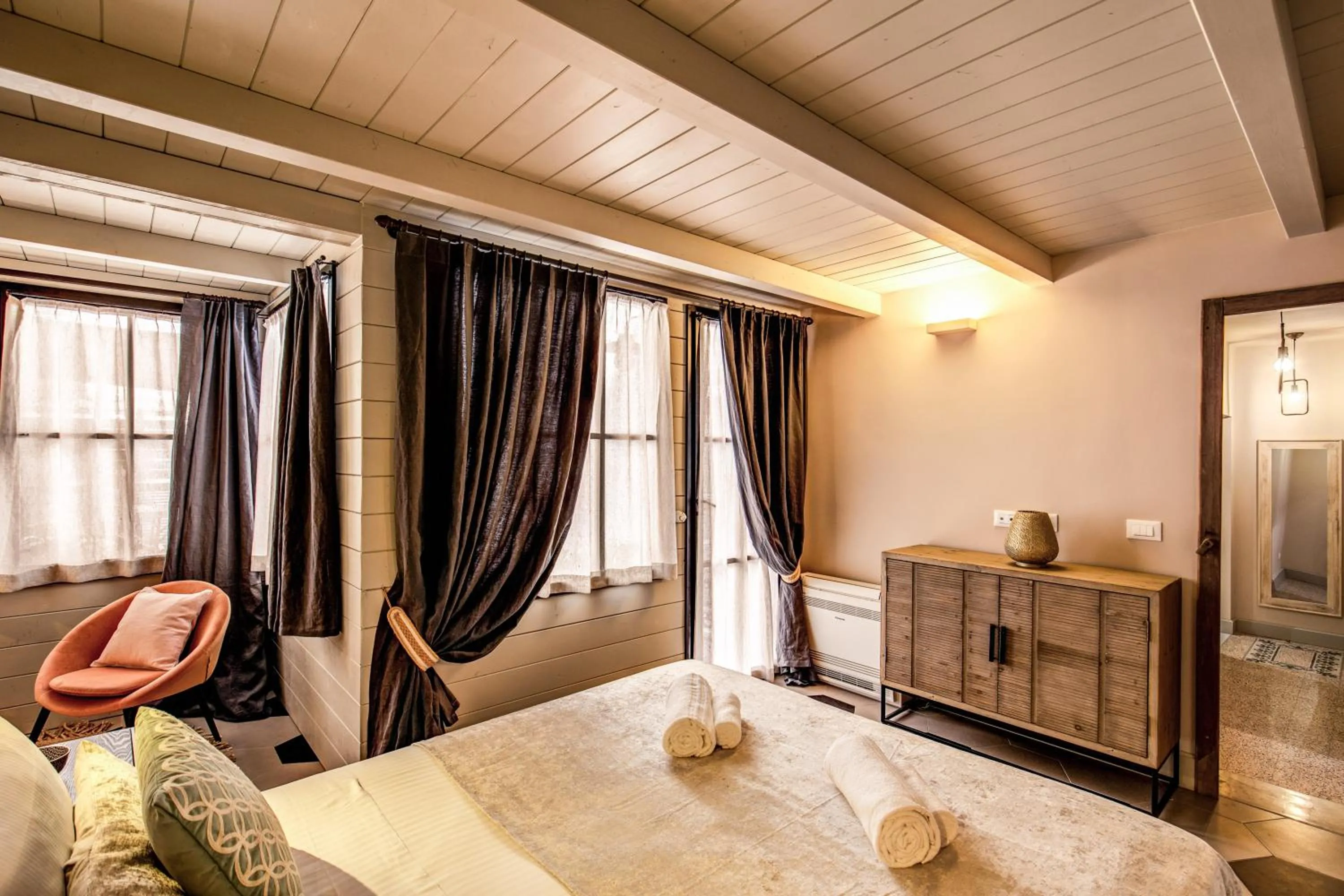 Bed in DeCharme apartment with terrace in Monti