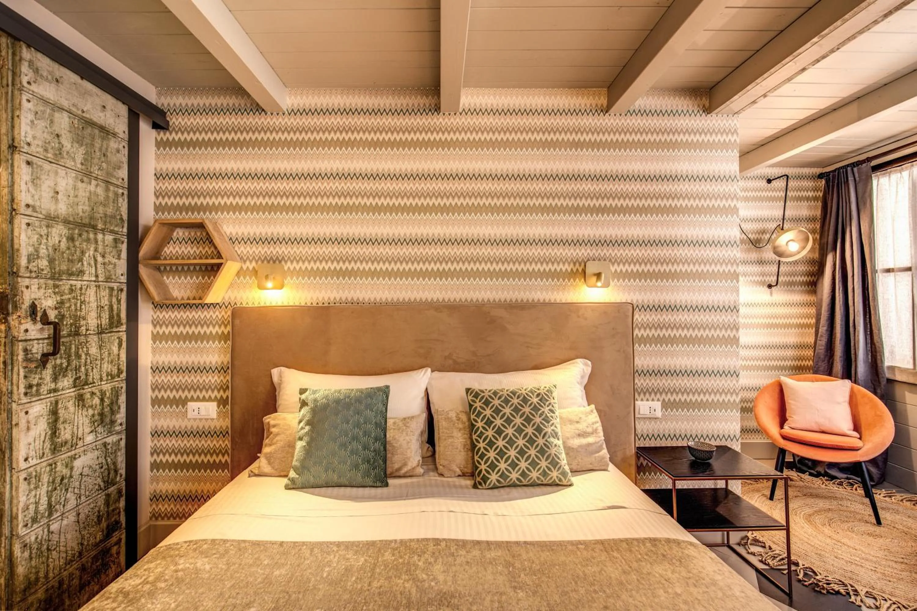 Bed in DeCharme apartment with terrace in Monti