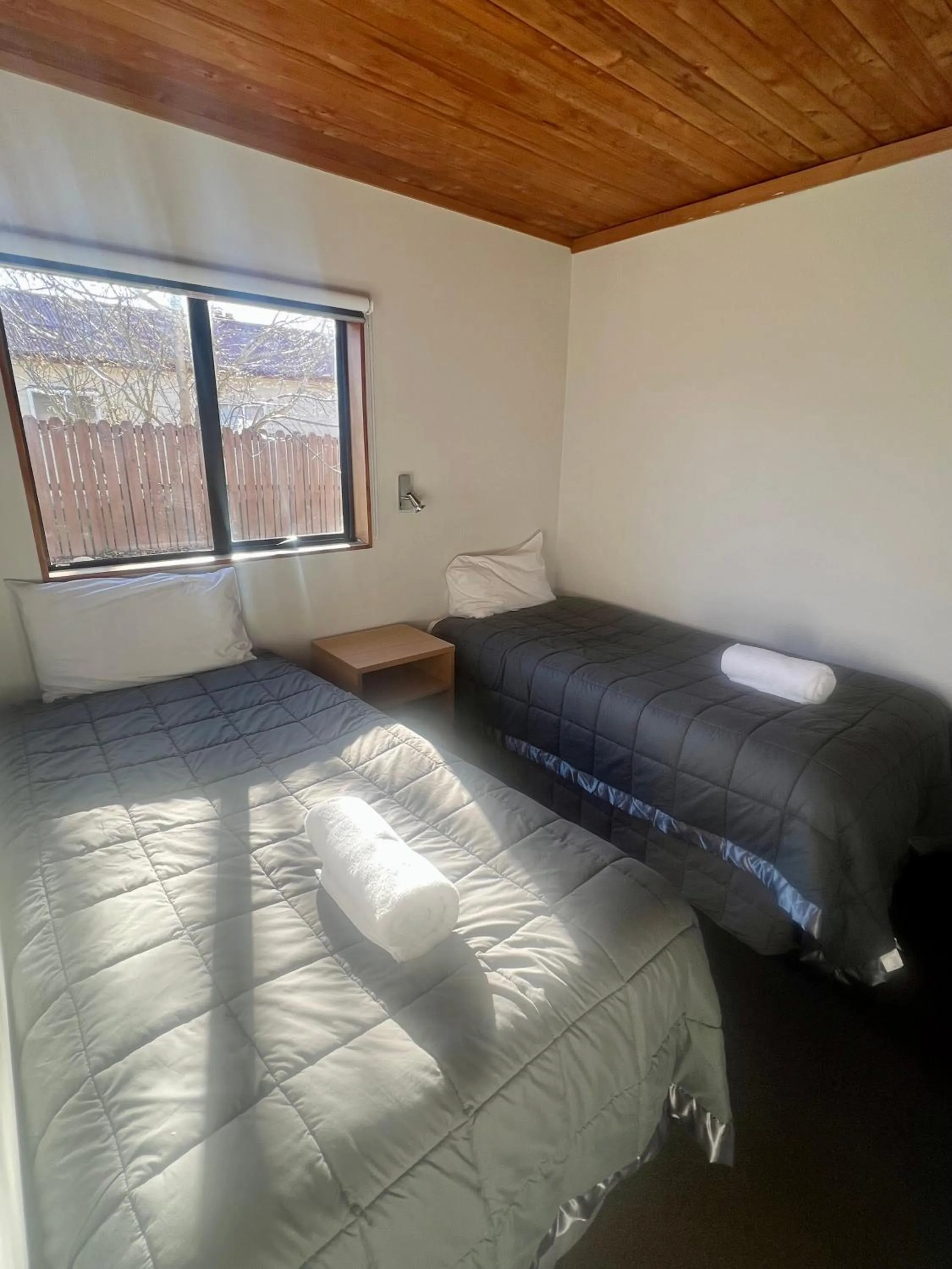 Bed in Pinewood Motels