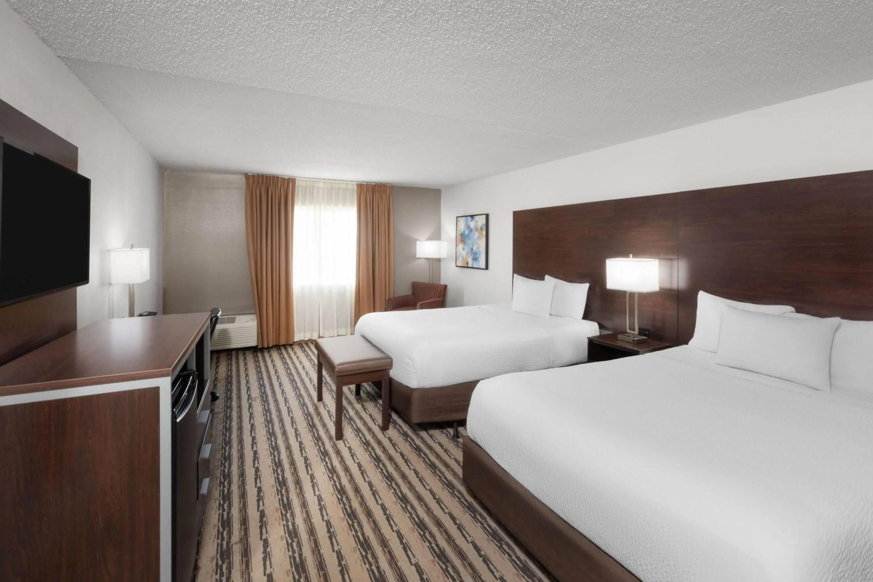 Photo of the whole room, Bed in Endeavor Inn & Suites, Trademark Collection by Wyndham