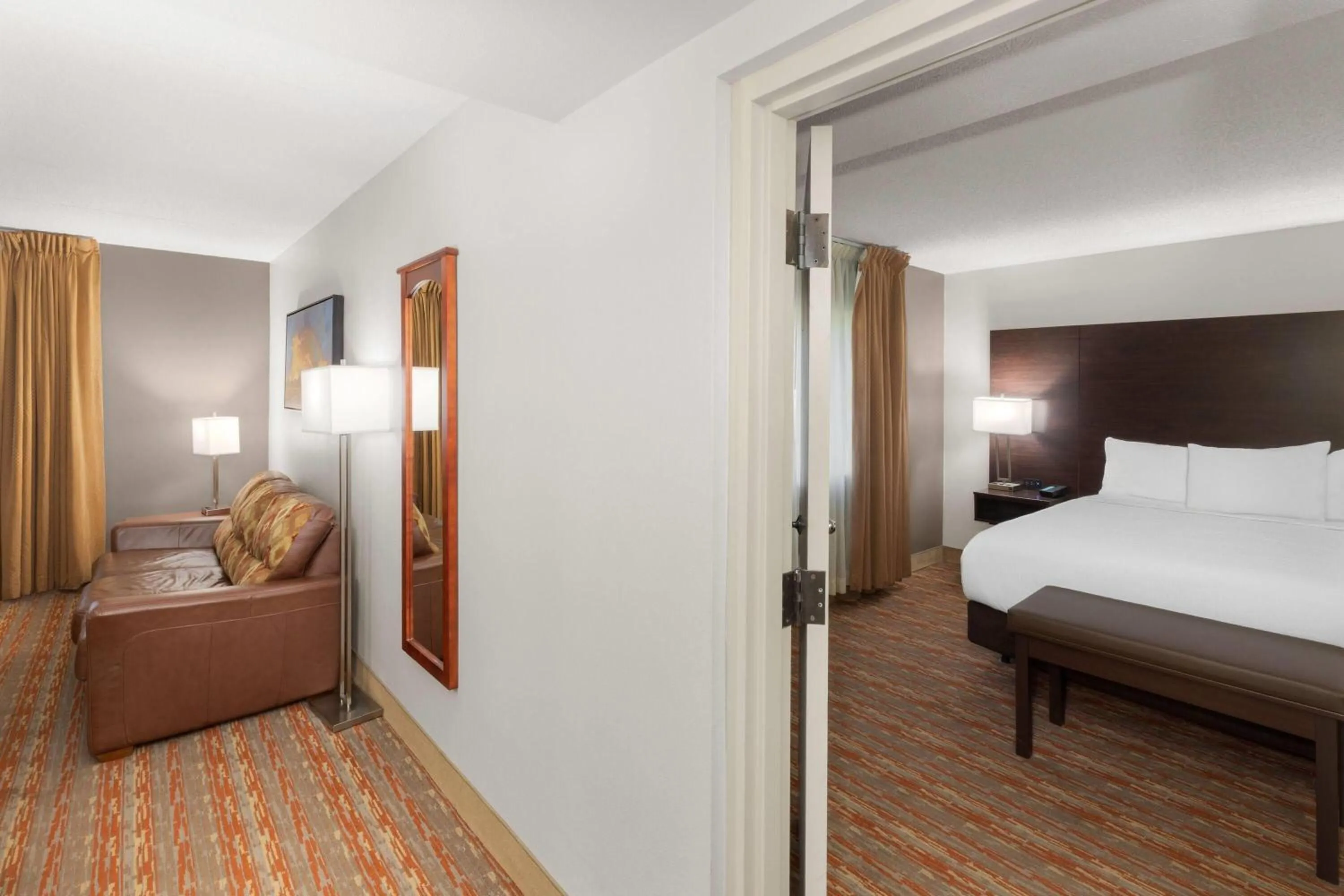 Photo of the whole room, Bed in Endeavor Inn & Suites, Trademark Collection by Wyndham