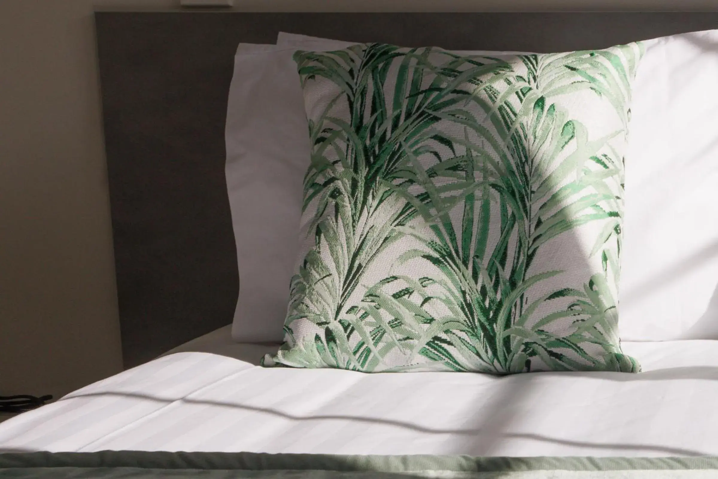 Bed in BK's Pohutukawa Lodge Bed in BK's Pohutukawa Lodge