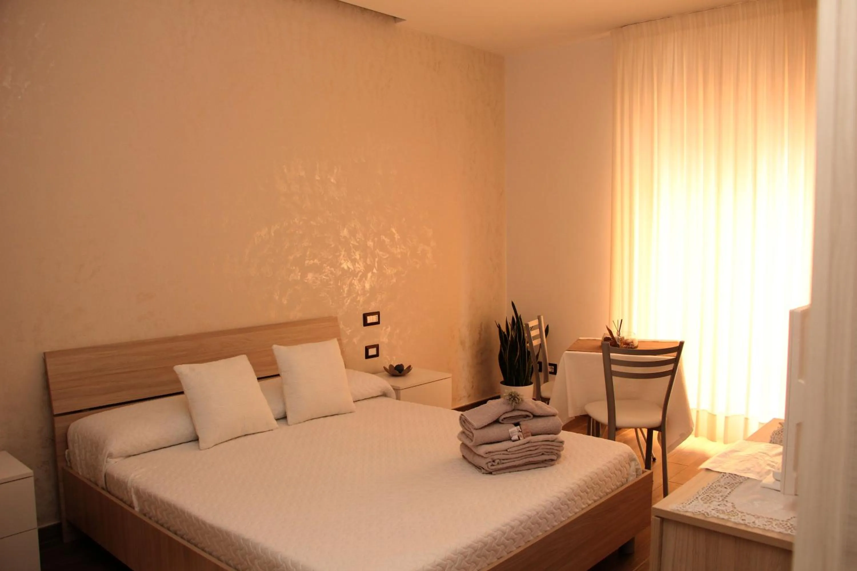 Bed in B&B Damiantò