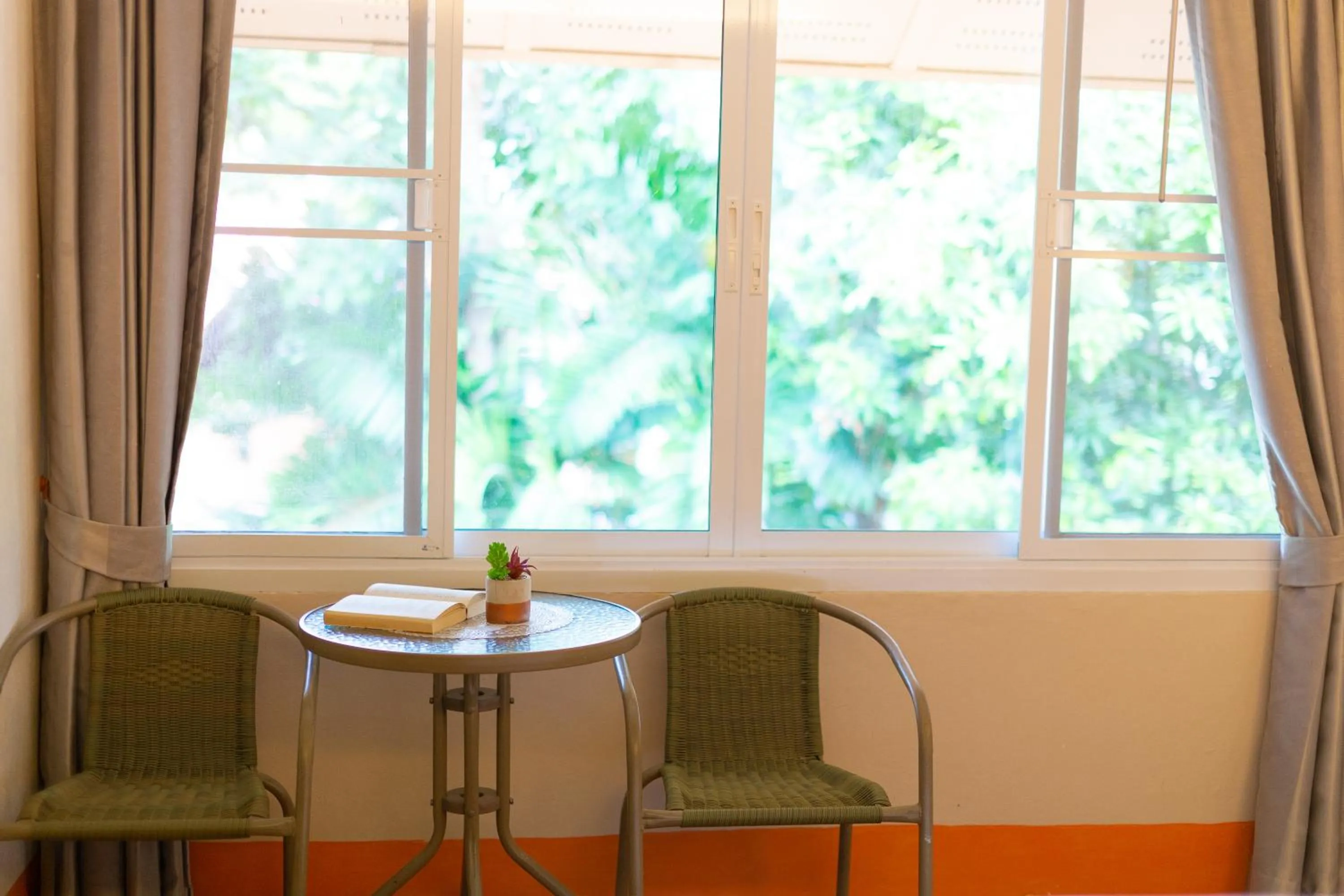 Seating area in Palm Coco Mantra