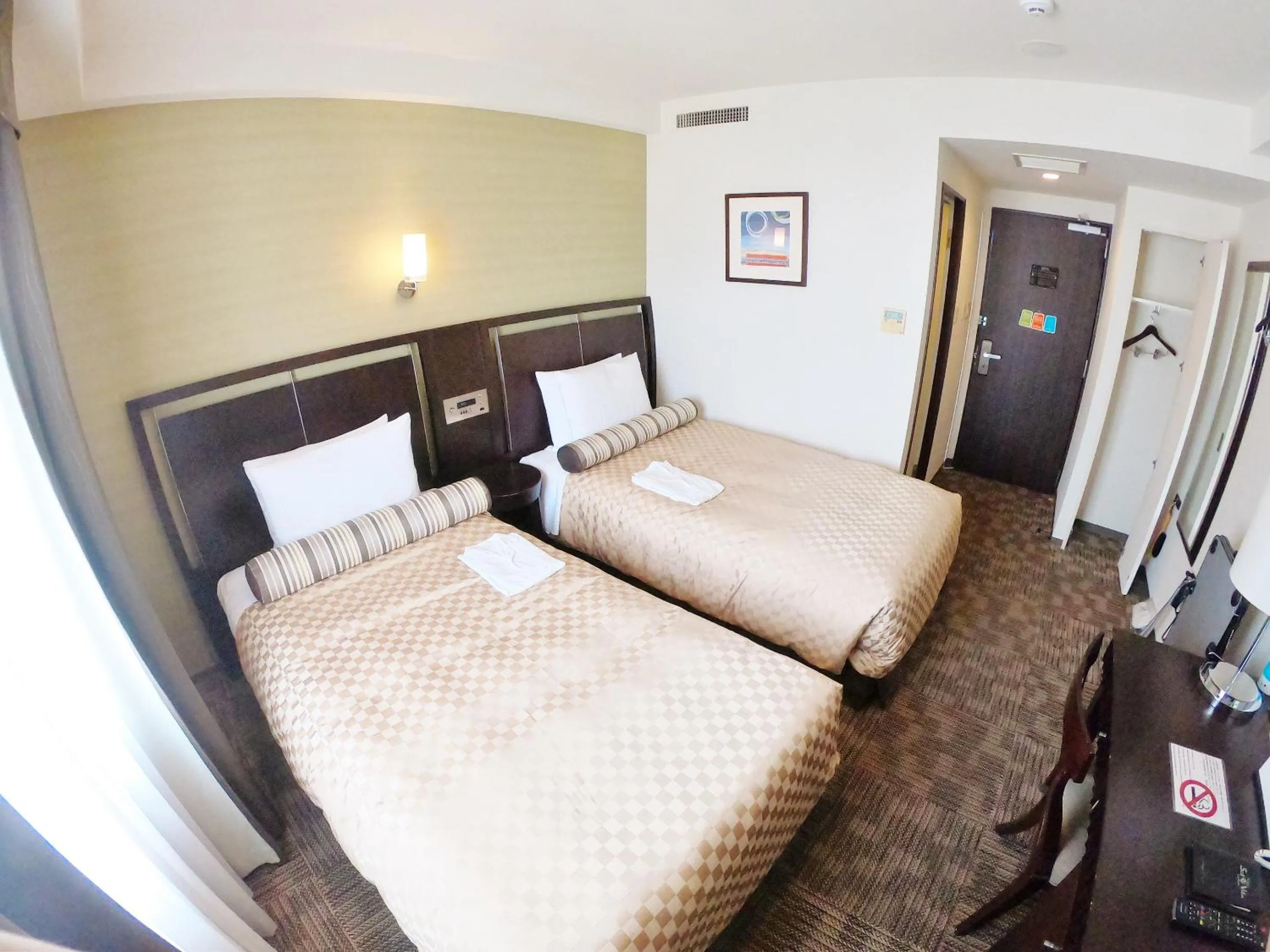 Photo of the whole room, Bed in Sol Vita Hotel Naha