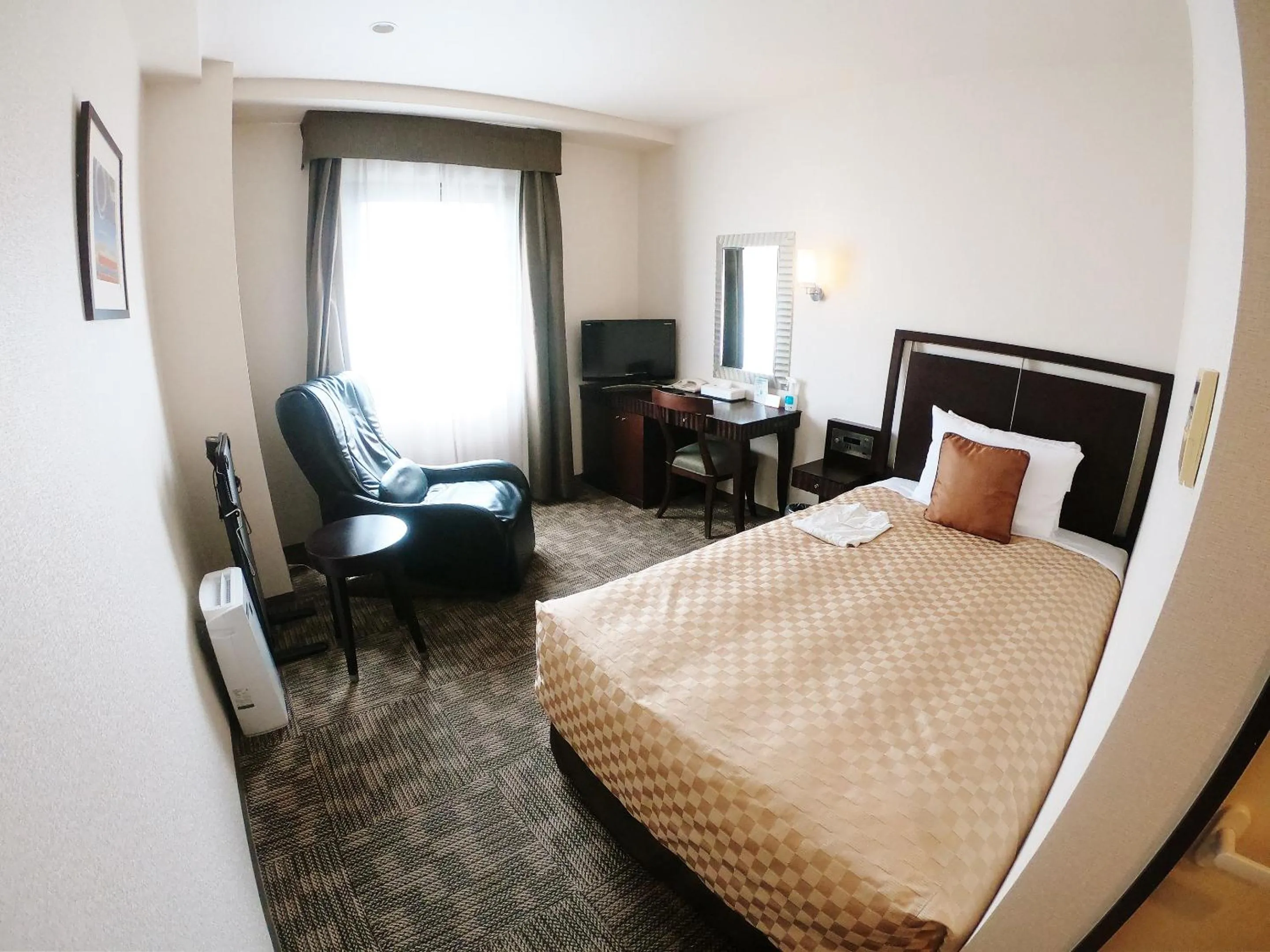 Photo of the whole room, Bed in Sol Vita Hotel Naha