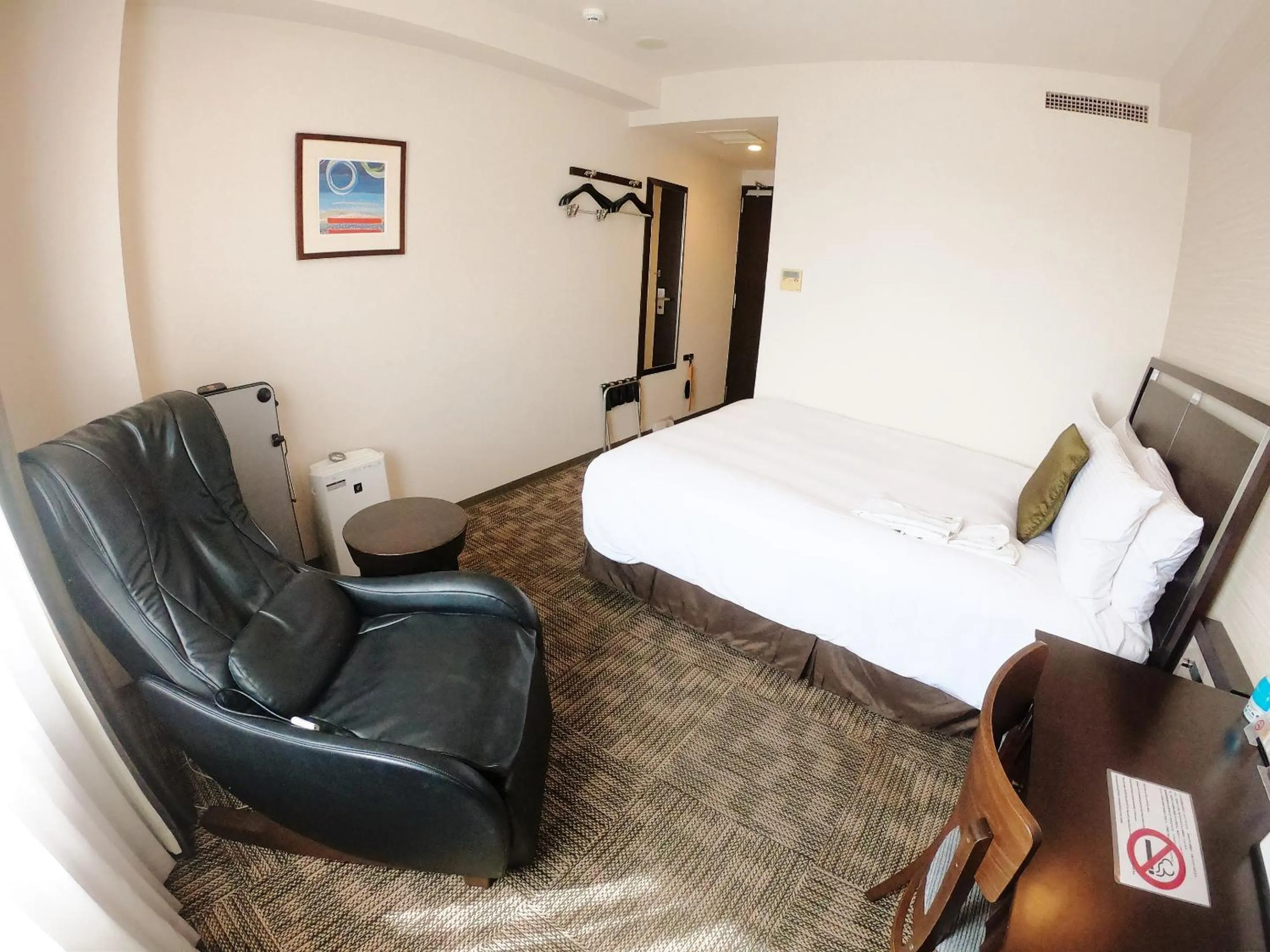 Photo of the whole room, Bed in Sol Vita Hotel Naha