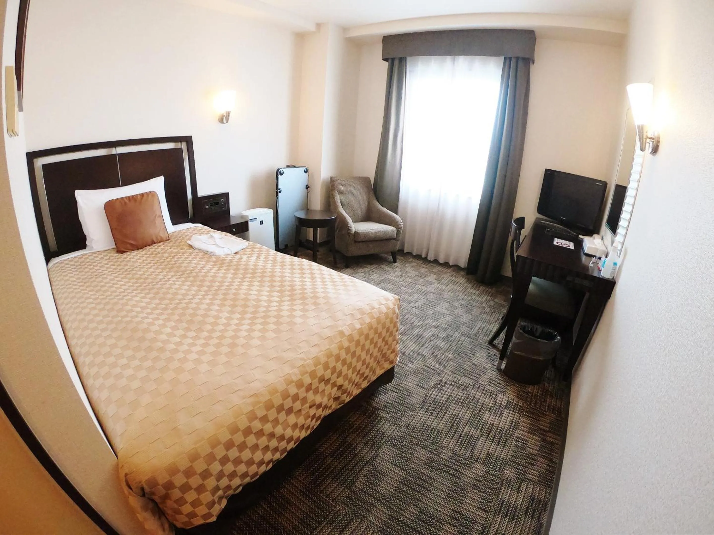 Photo of the whole room, Bed in Sol Vita Hotel Naha