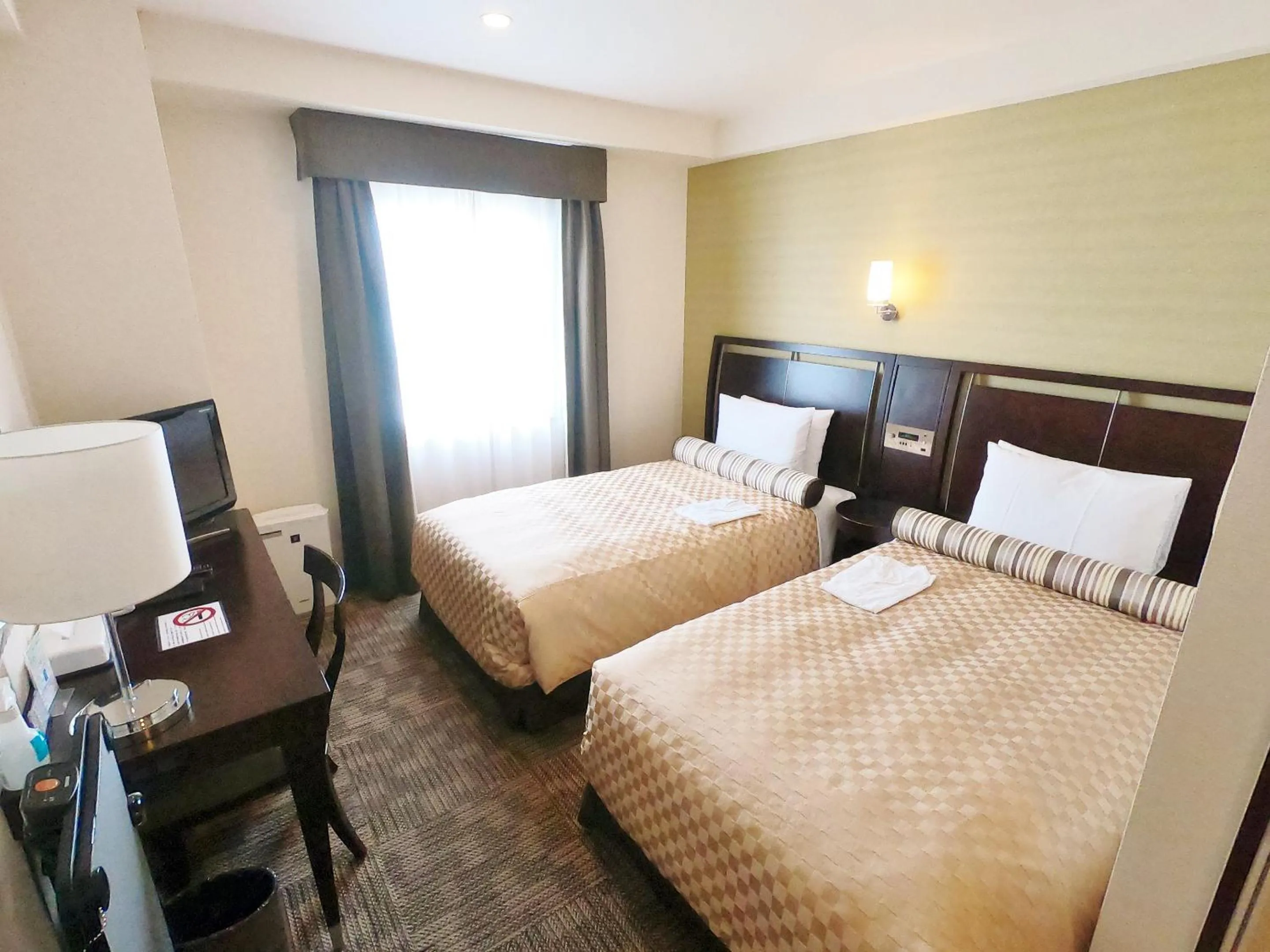 Photo of the whole room, Bed in Sol Vita Hotel Naha