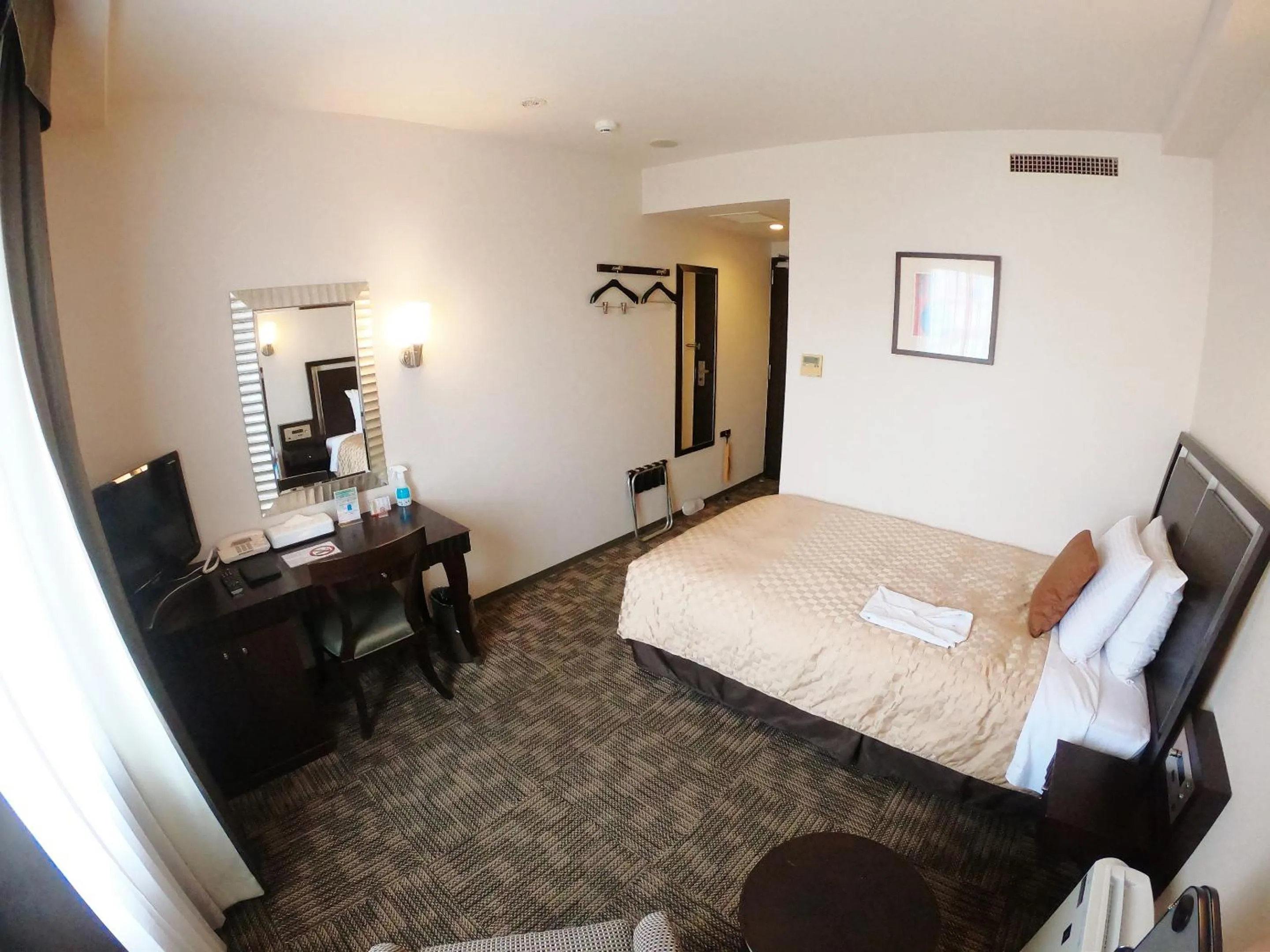 Photo of the whole room, Bed in Sol Vita Hotel Naha