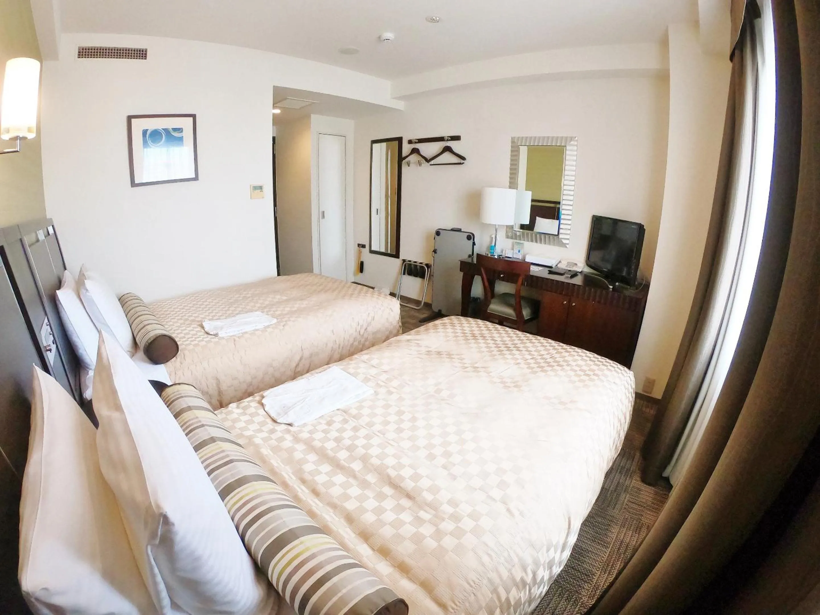 Photo of the whole room, Bed in Sol Vita Hotel Naha