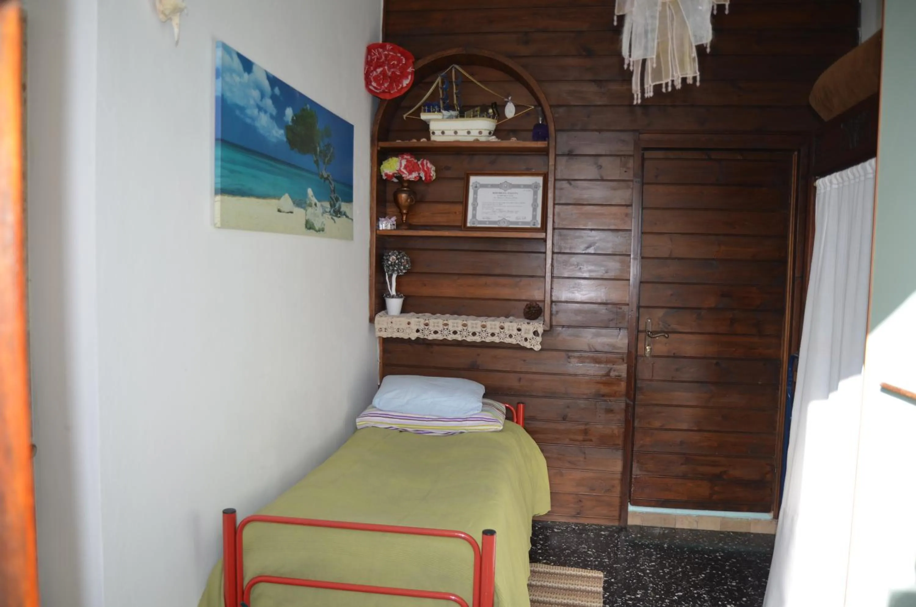 Bed in LA CASTELLANA Una Finestra sul Mare- Air Conditioned