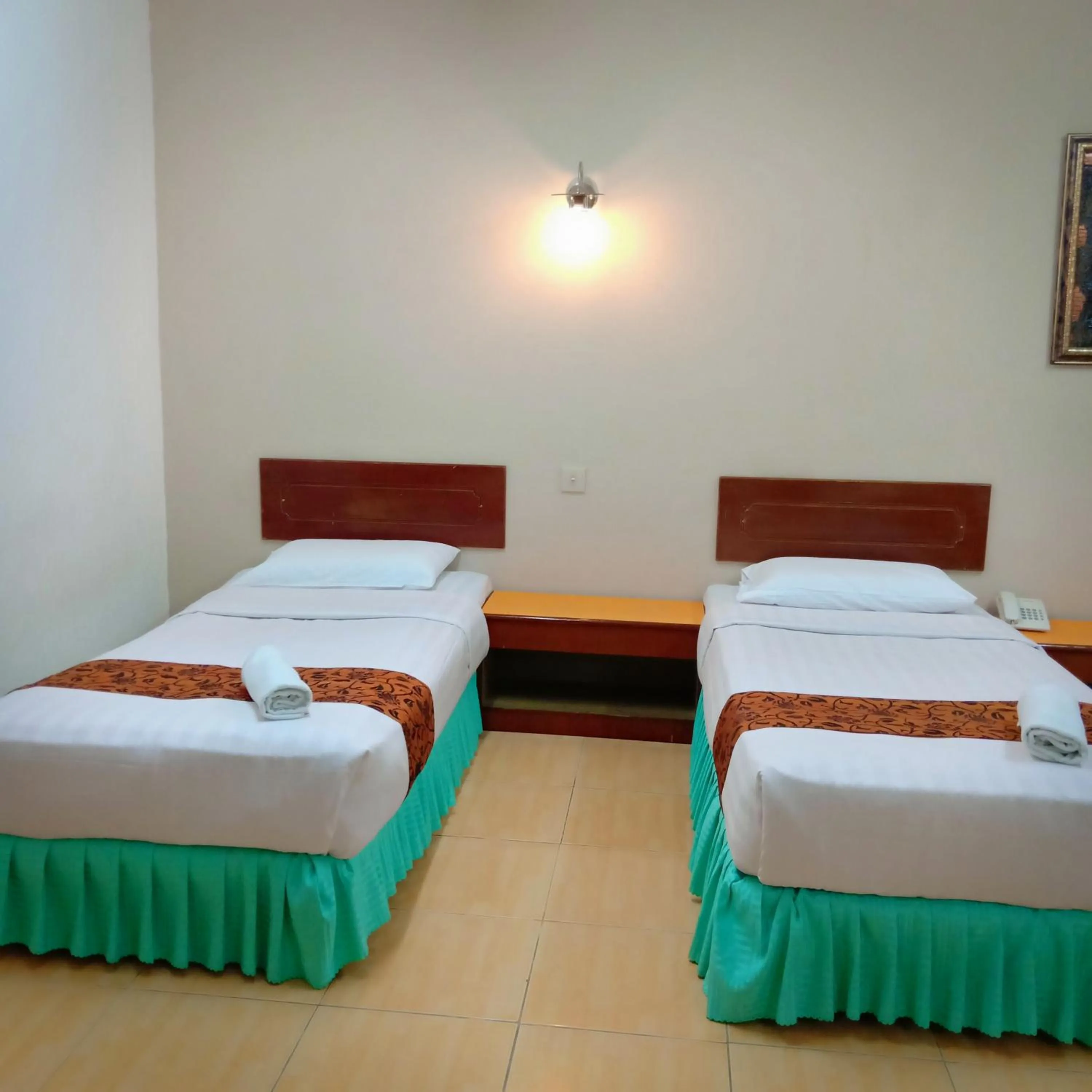 Bed in Hotel K T Mutiara