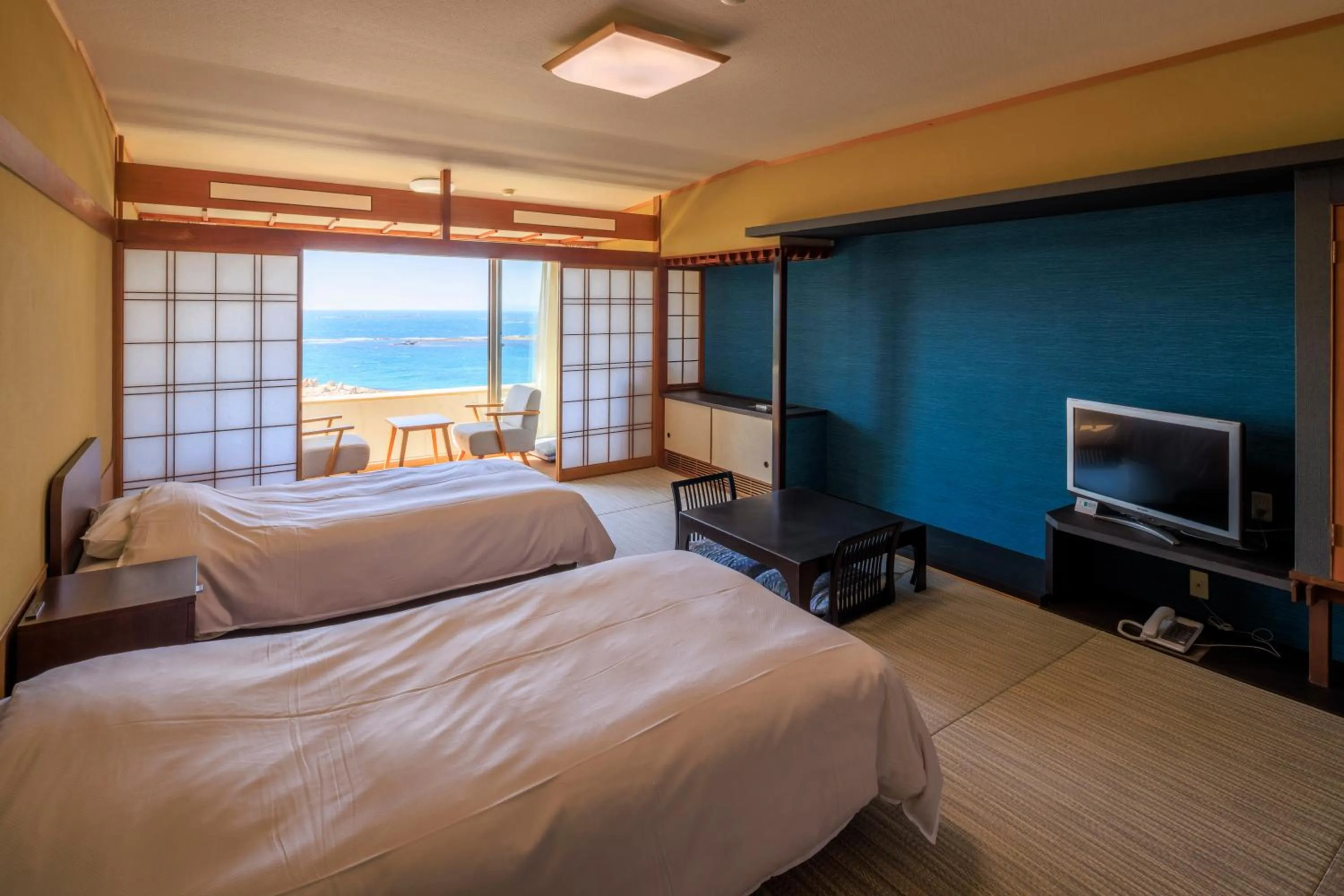 Bed in Hotel Sanrakuso