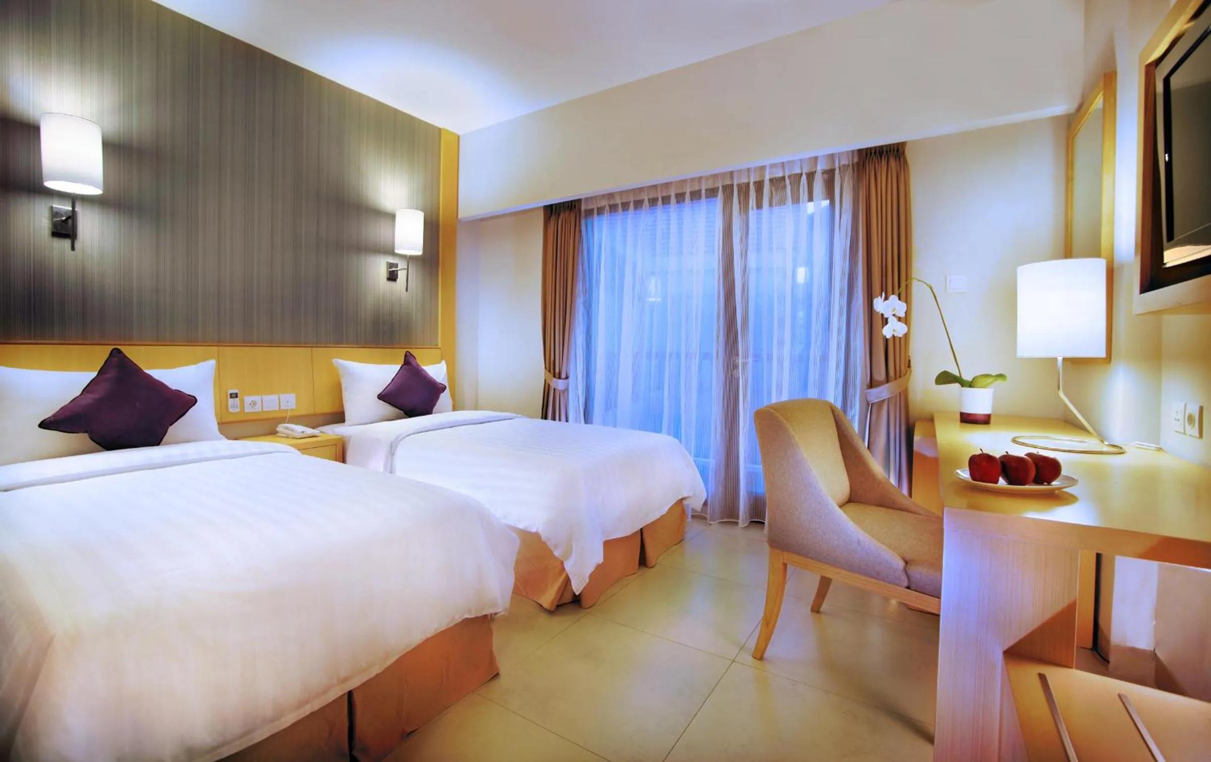Bedroom, Bed in Quest Hotel Kuta by ASTON