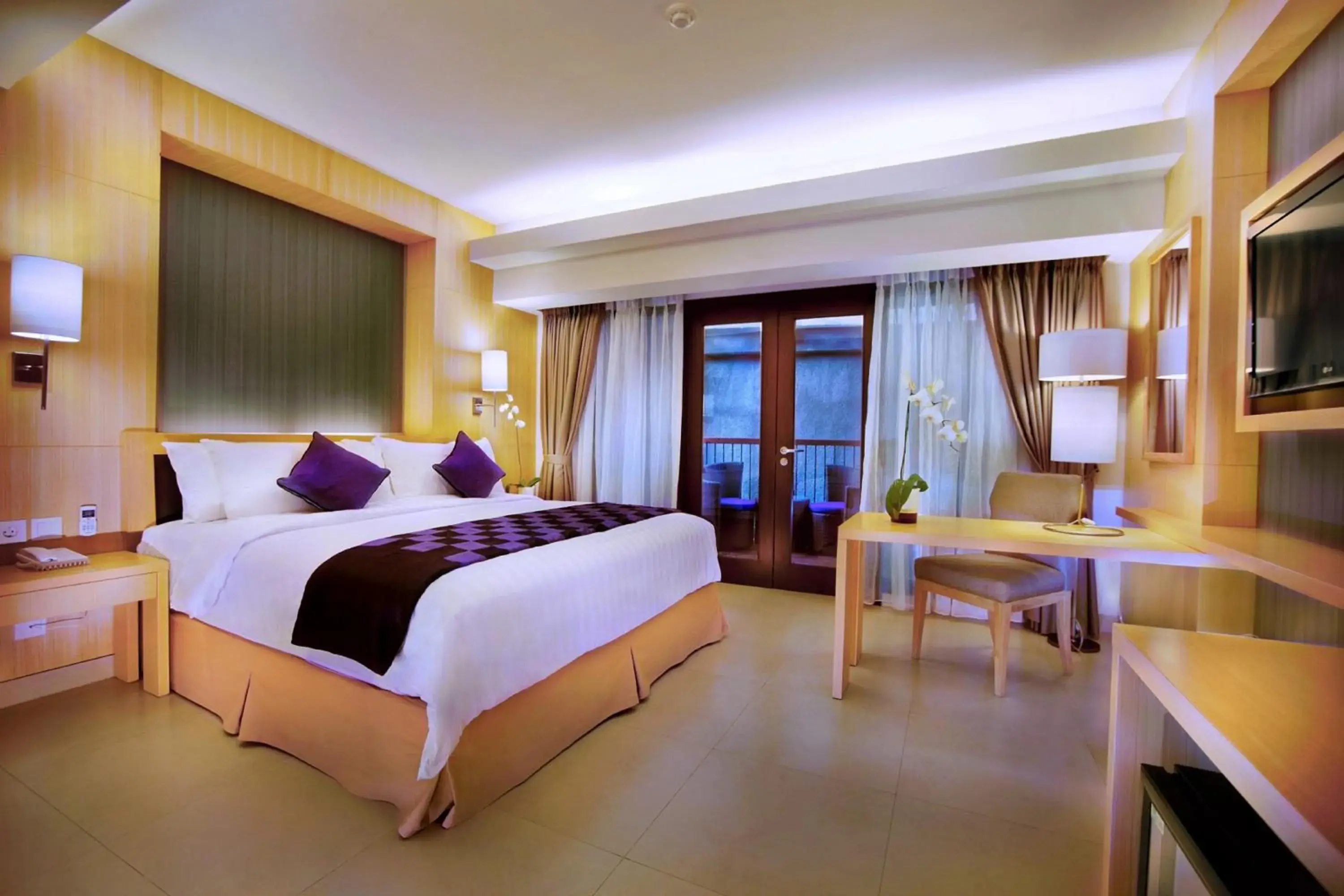 Bedroom, Bed in Quest Hotel Kuta by ASTON