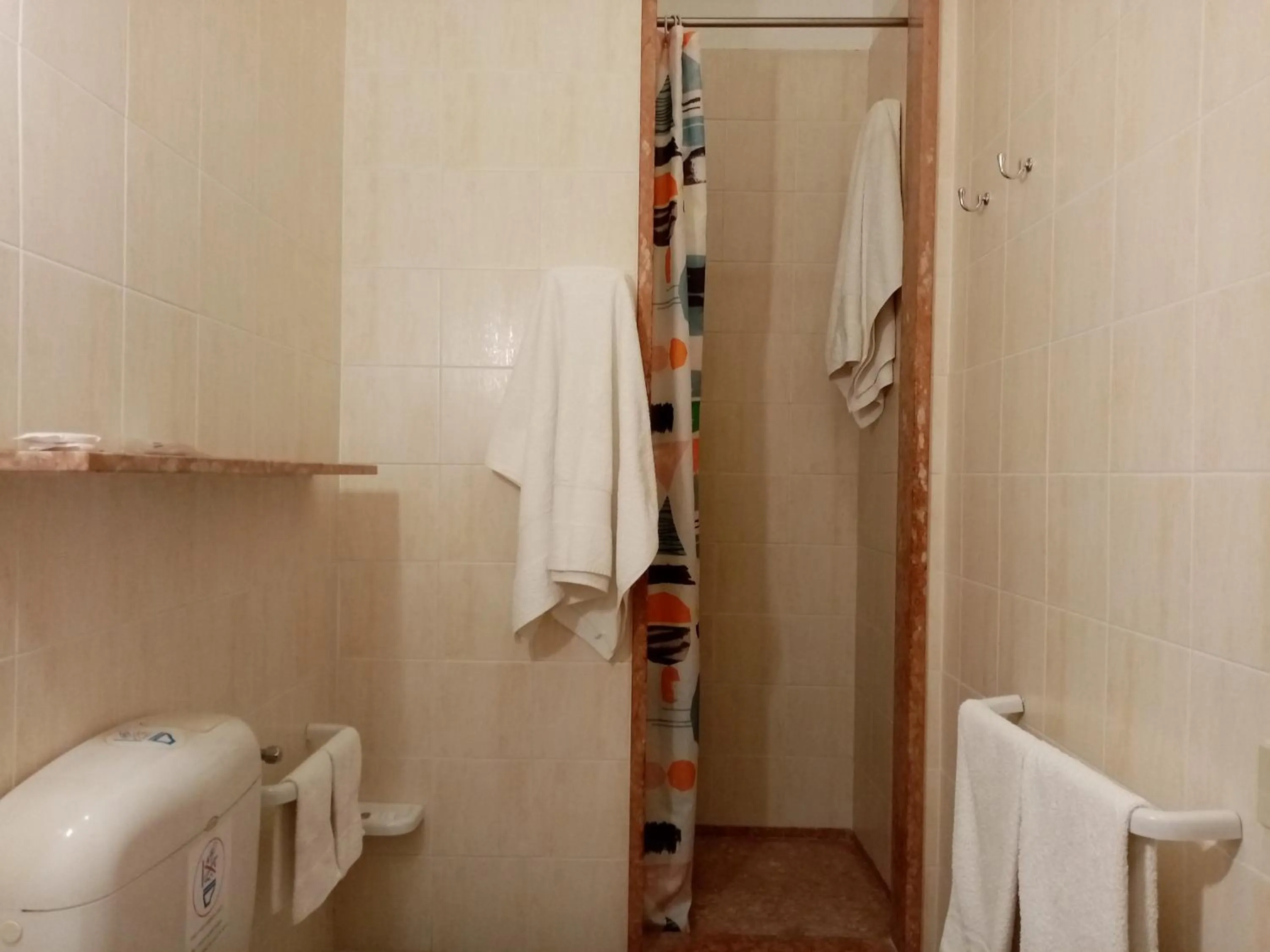 Bathroom in Ariston Petit Hotel