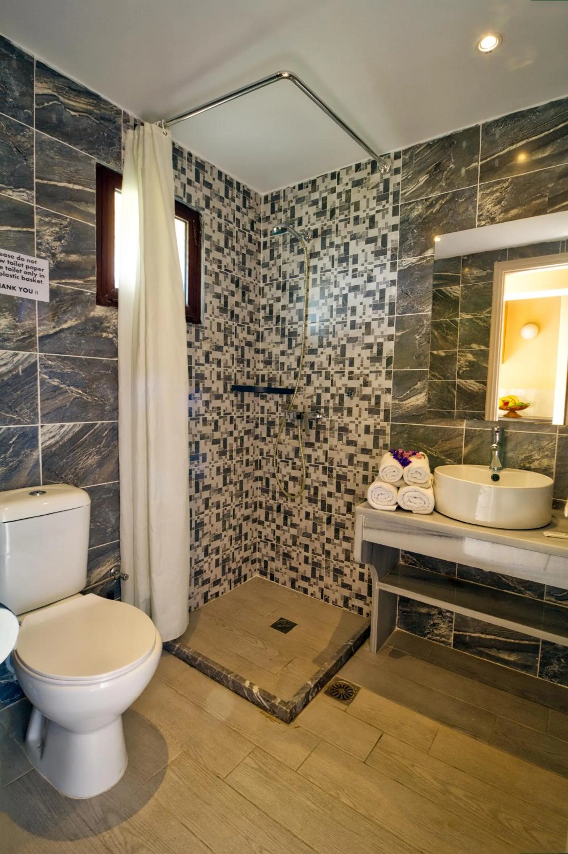 Shower in Two Brothers Studios & Apts