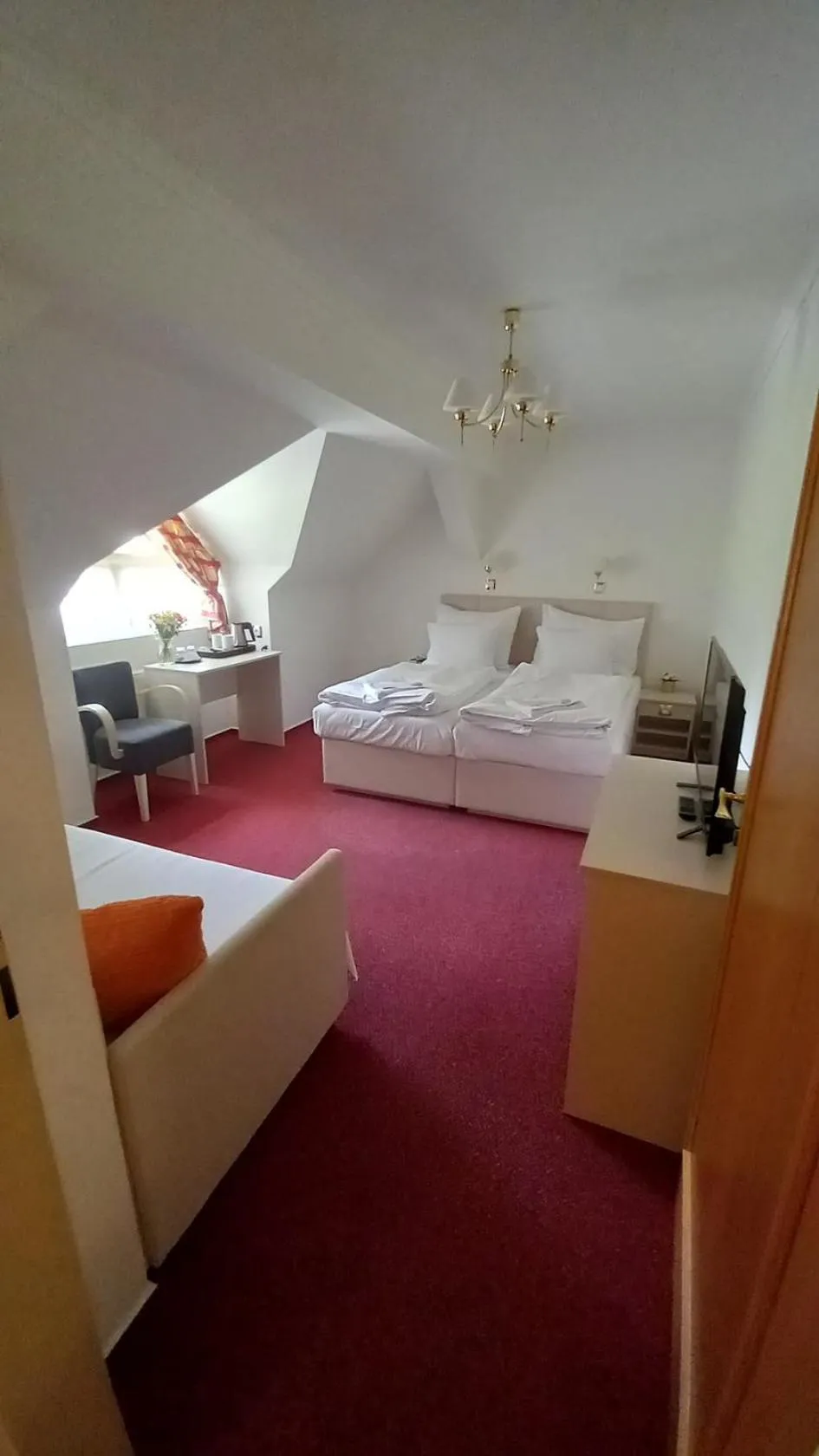 Property building, Bed in Hotel Hradec