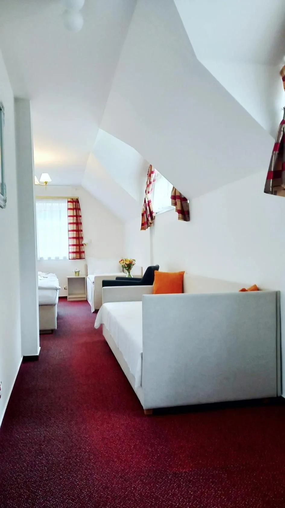 Seating area, Bed in Hotel Hradec