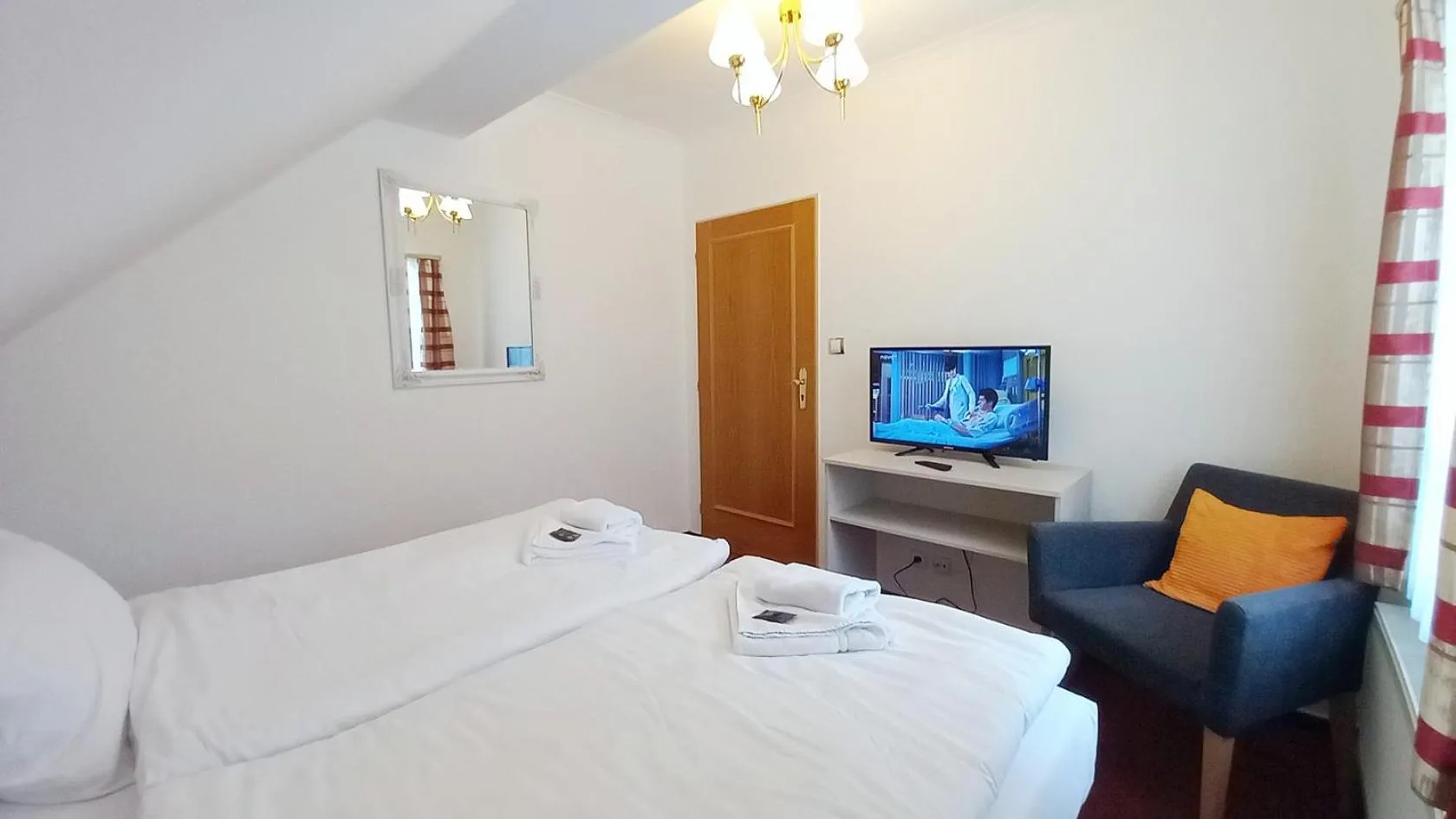 Property building, Bed in Hotel Hradec