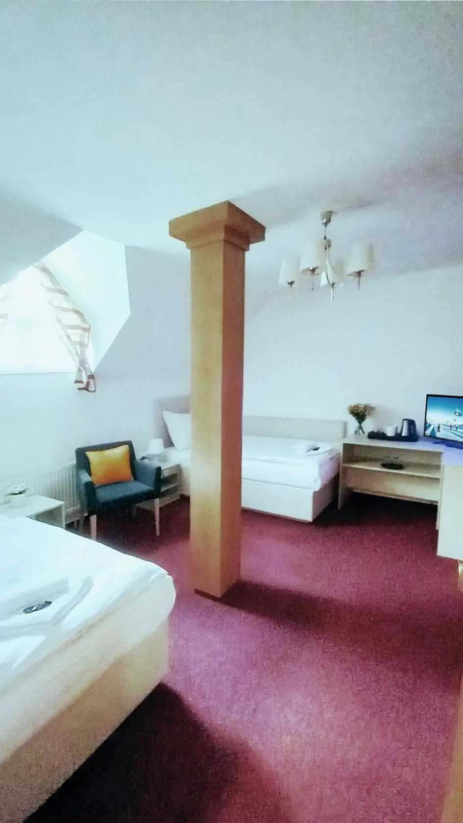 Property building, Bed in Hotel Hradec