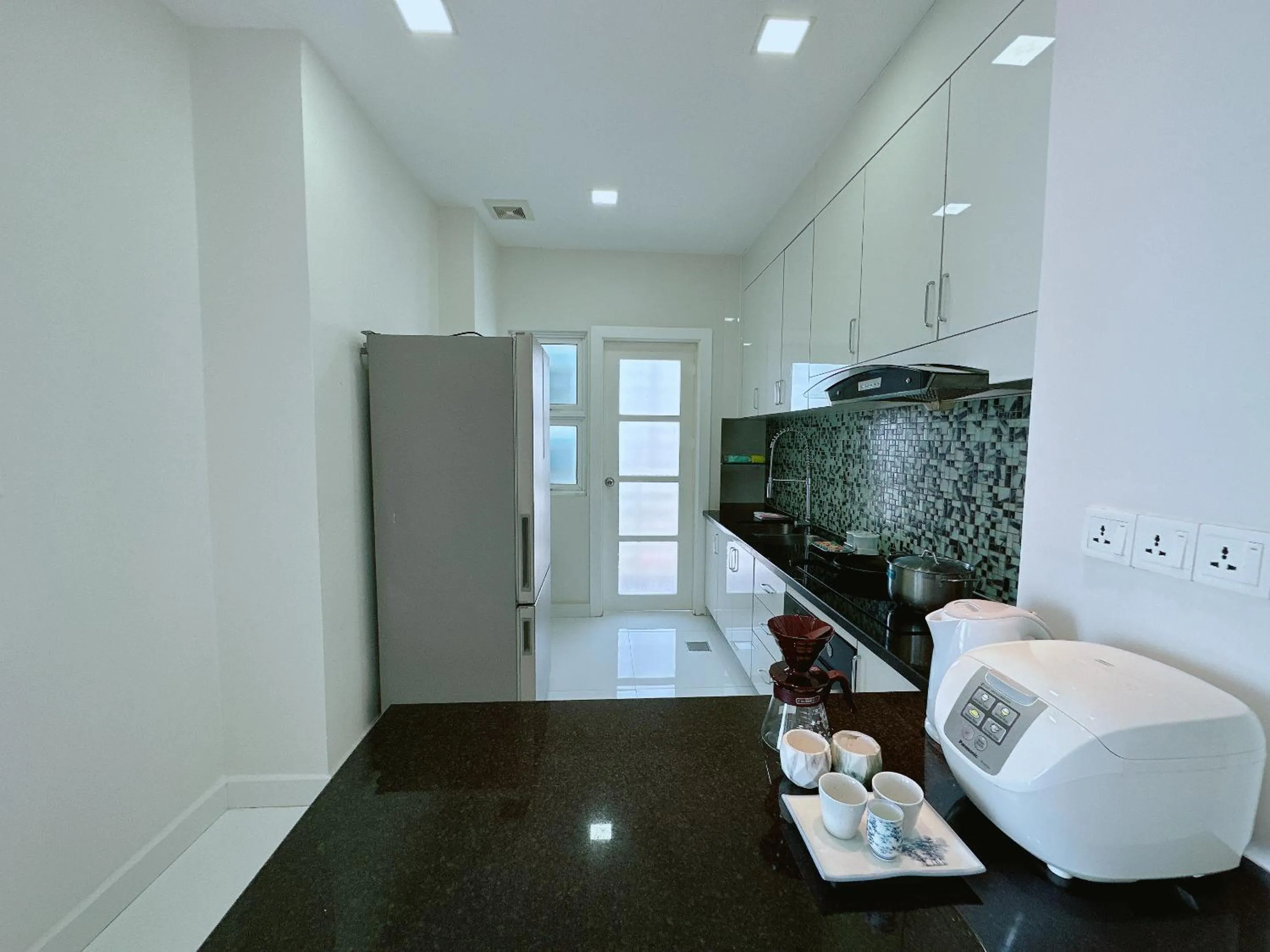 Kitchen or kitchenette in Infinity 28 Hotel and Residence