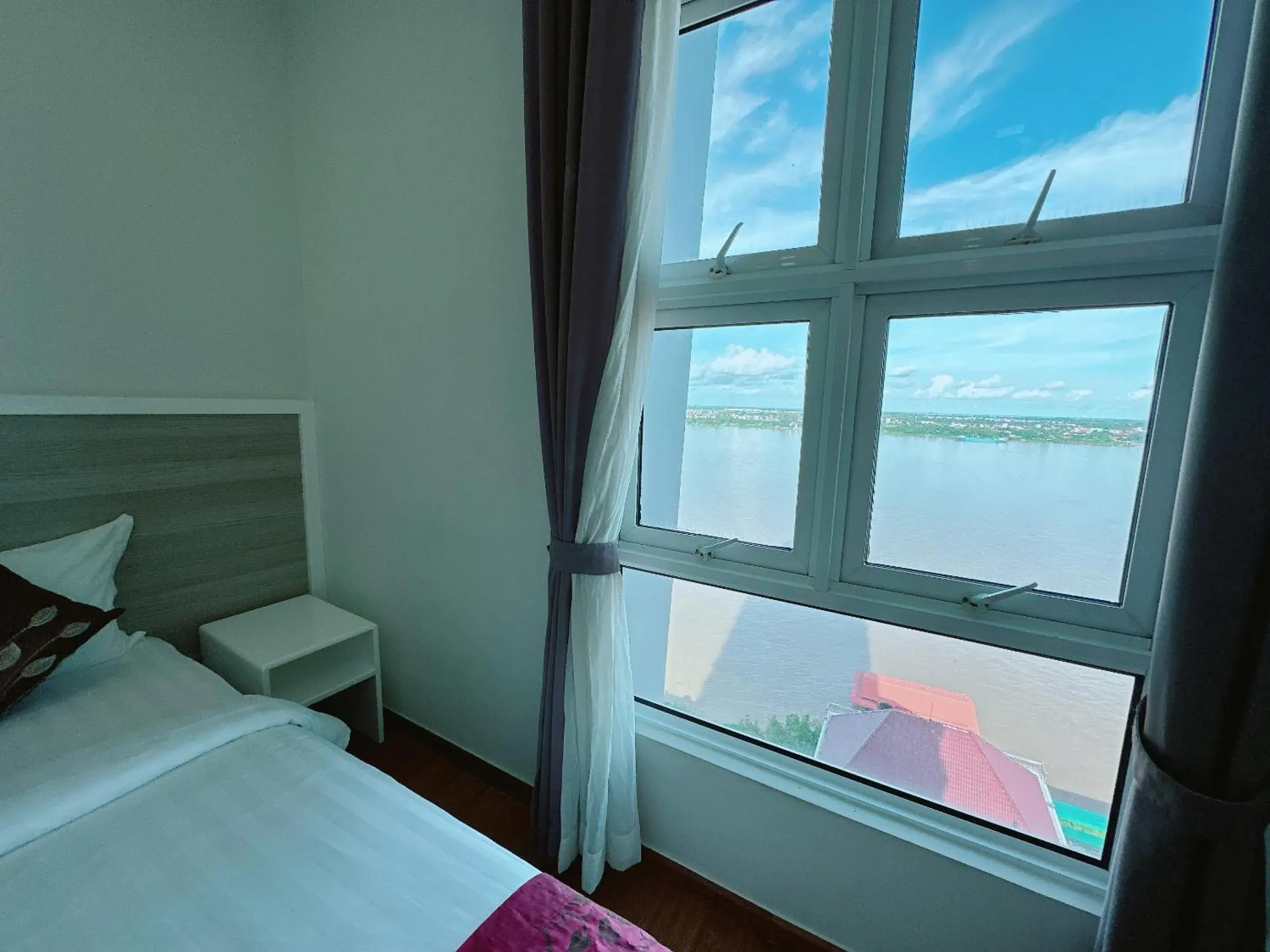 View (from property/room), Bed in Infinity 28 Hotel and Residence View (from property/room), Bed in Infinity 28 Hotel and Residence