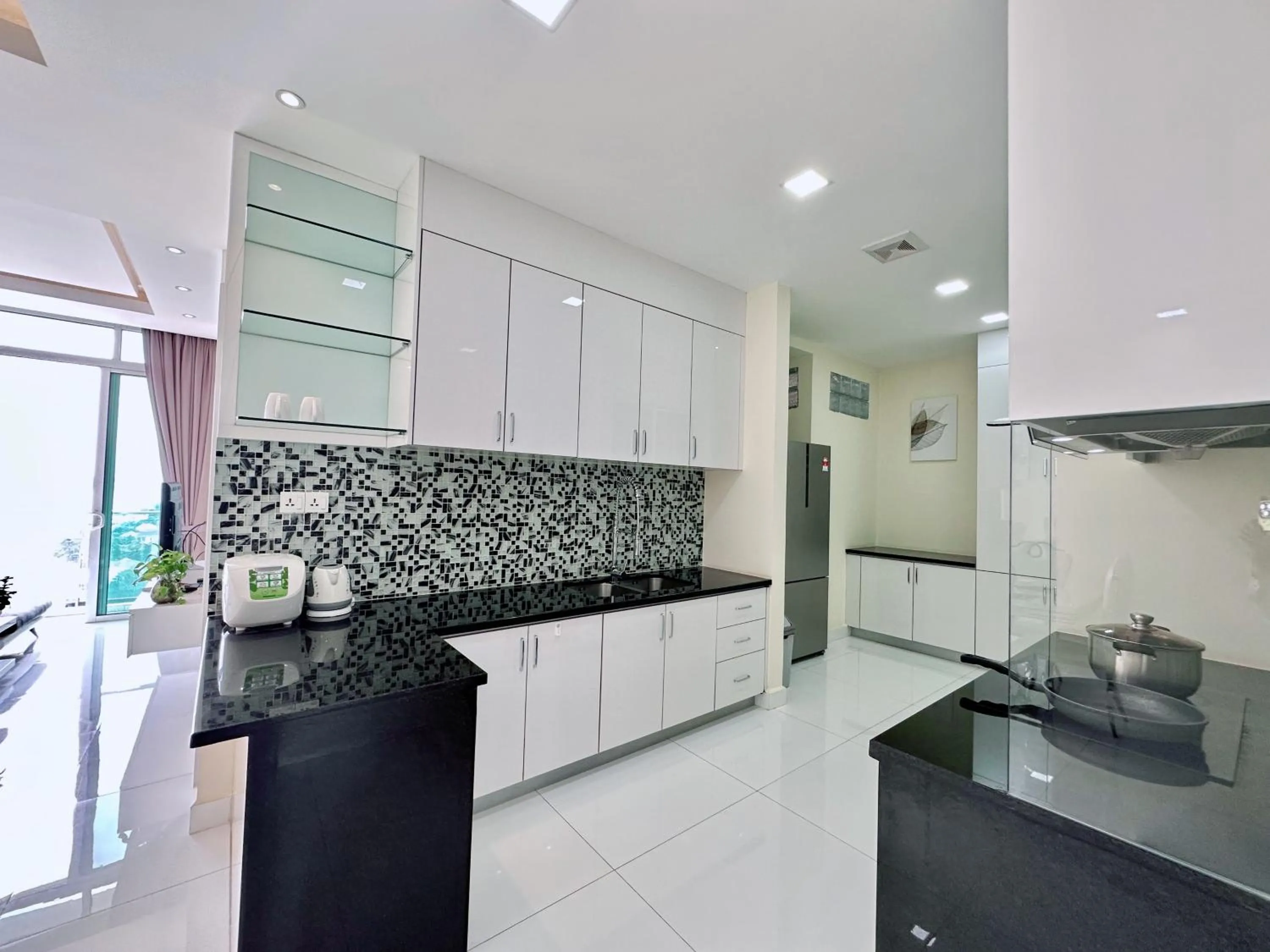 Kitchen or kitchenette in Infinity 28 Hotel and Residence