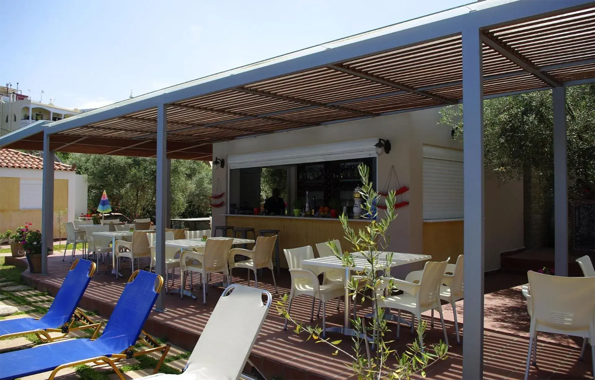 Lounge or bar in Elea Lounge or bar in Elea