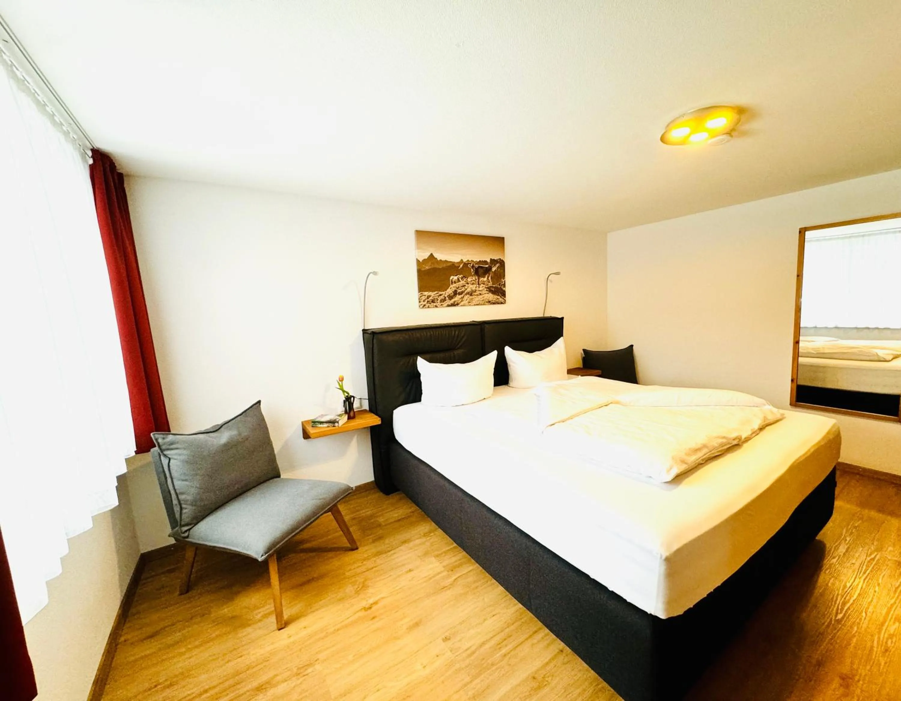 Bed in Appartement-Hotel-Allgayer