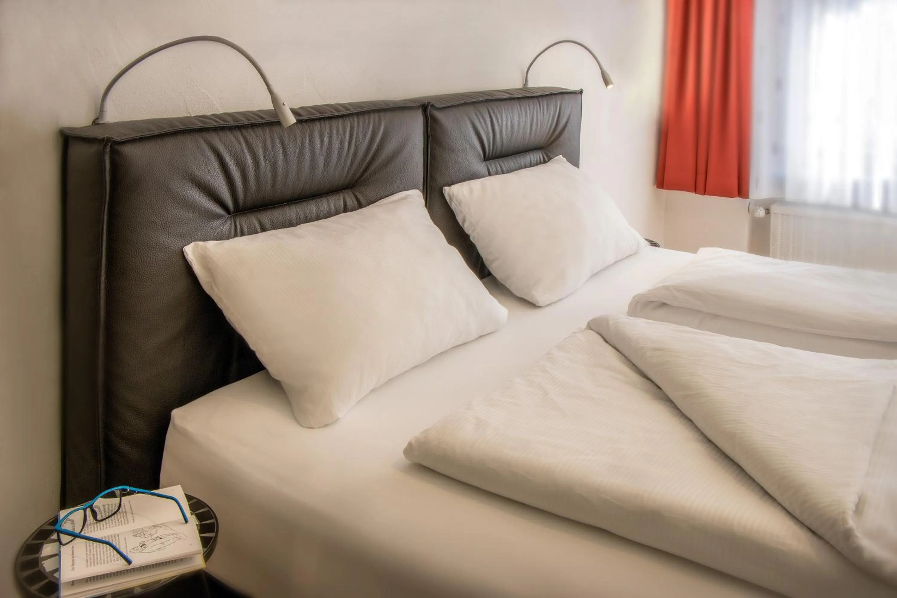 Bed in Appartement-Hotel-Allgayer