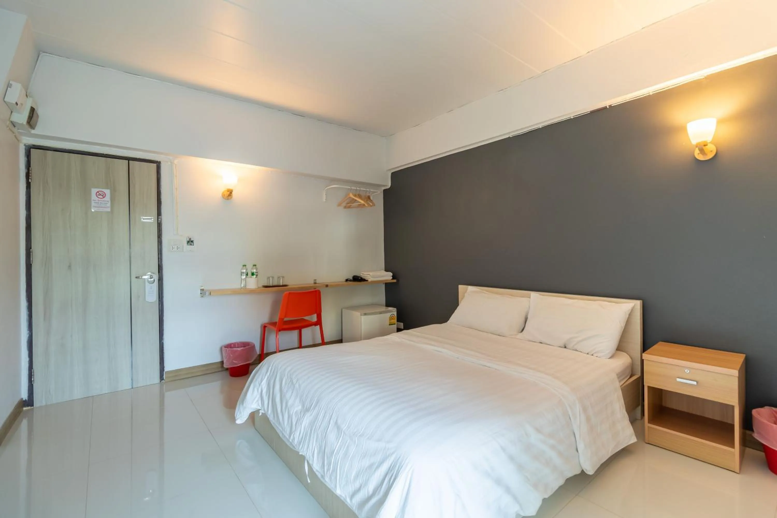 Bed in Living Naraa Place