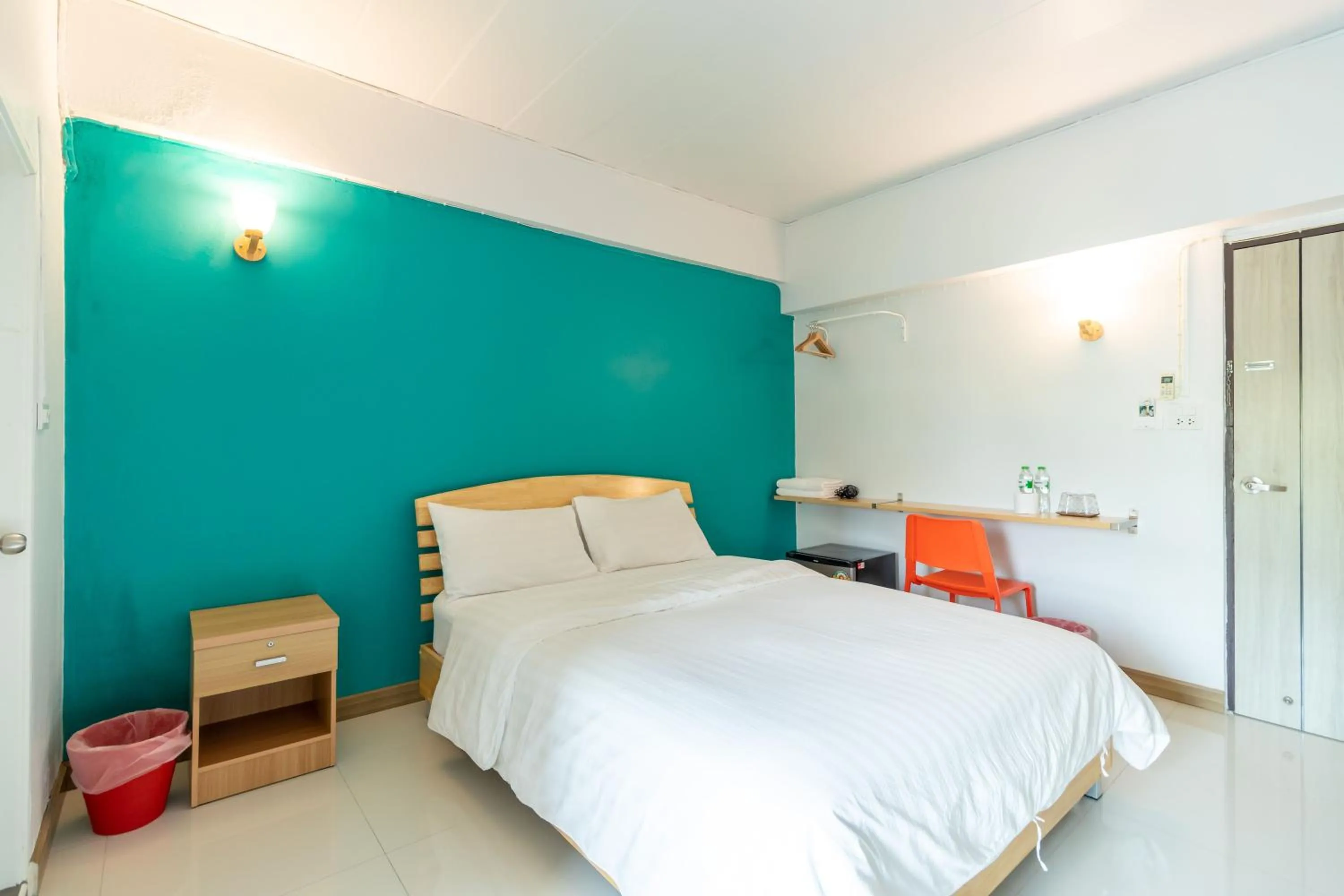 Photo of the whole room, Bed in Living Naraa Place