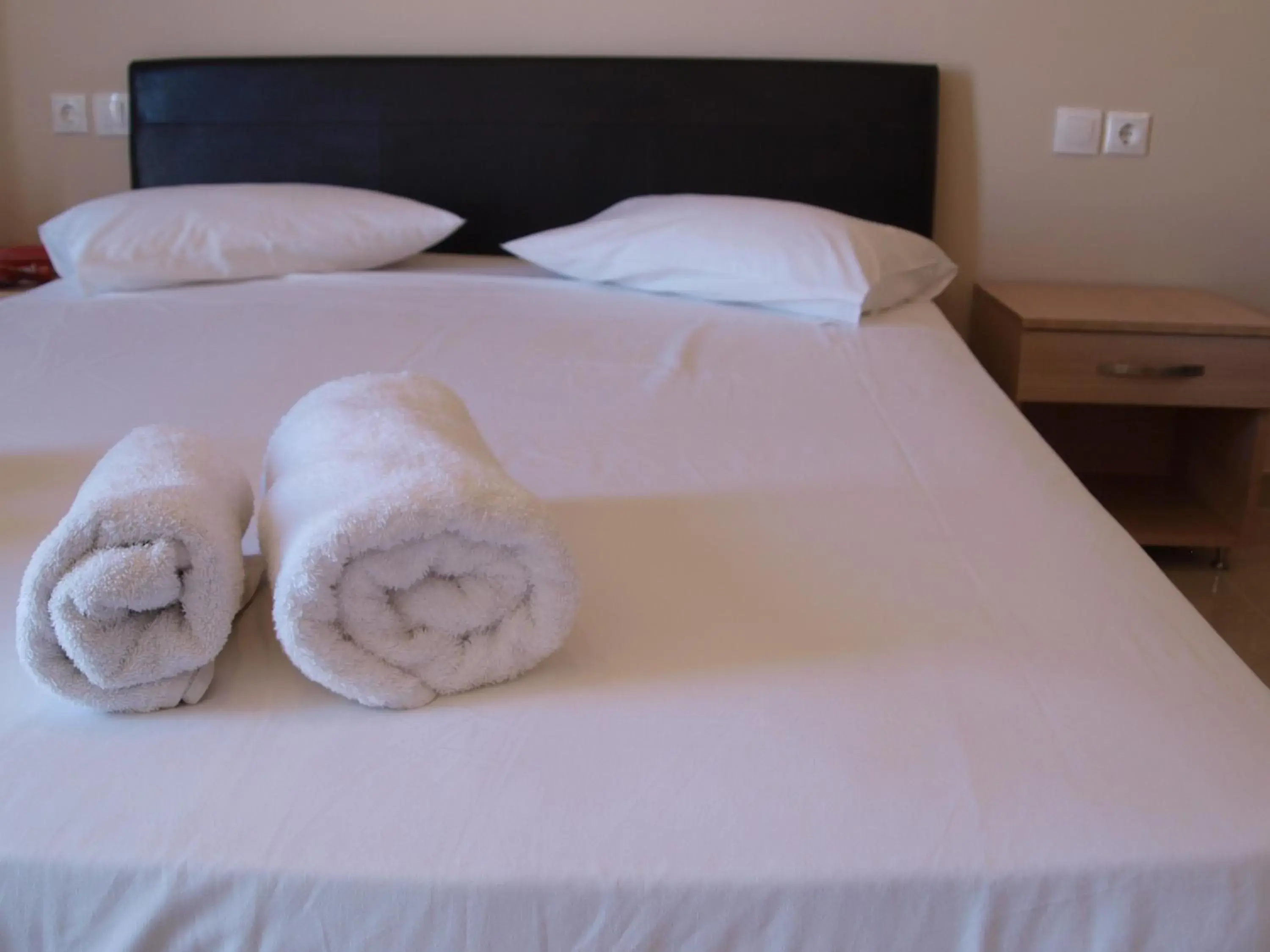 Bed in Carina Hotel Bed in Carina Hotel