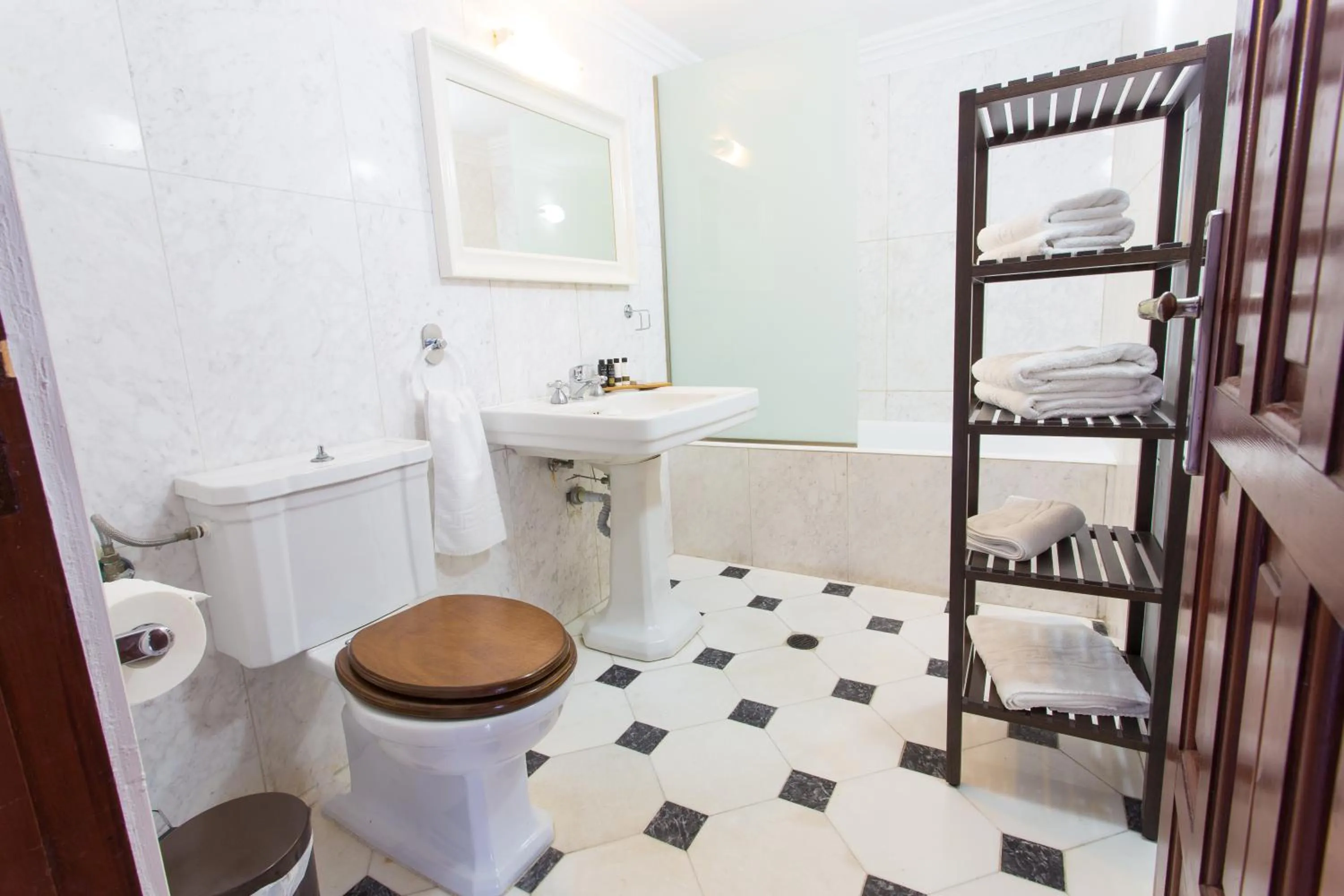 Toilet in Thea Villas and Suite