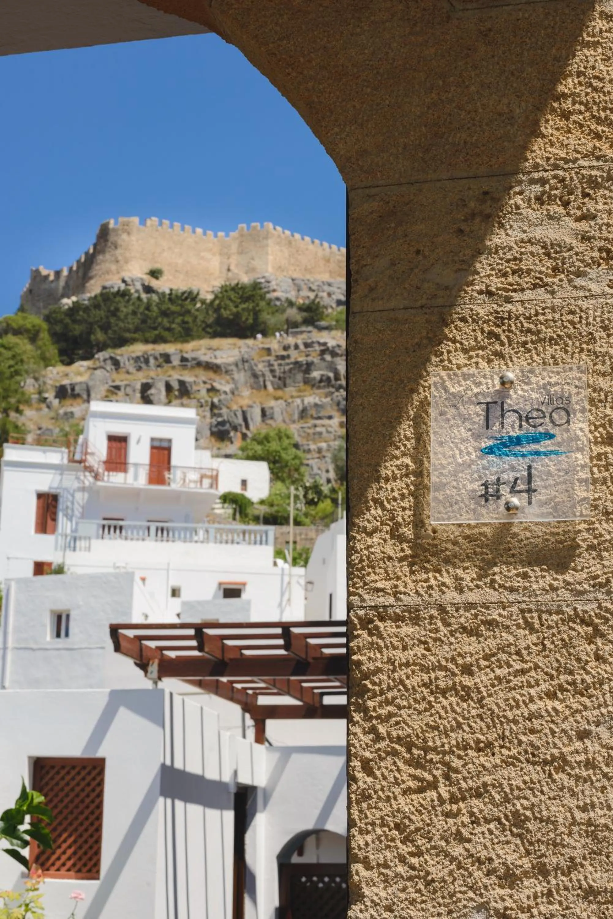 Property logo or sign in Thea Villas and Suite