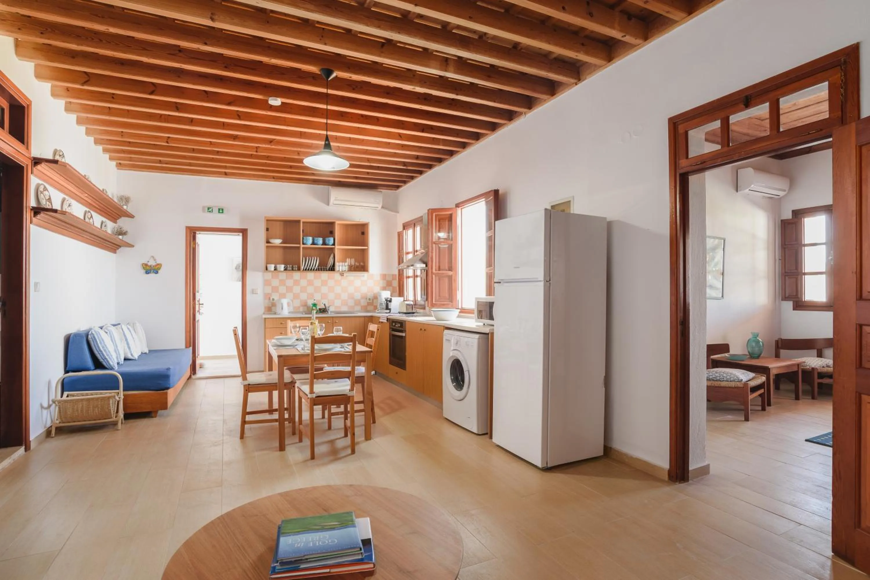 Kitchen or kitchenette in Thea Villas and Suite