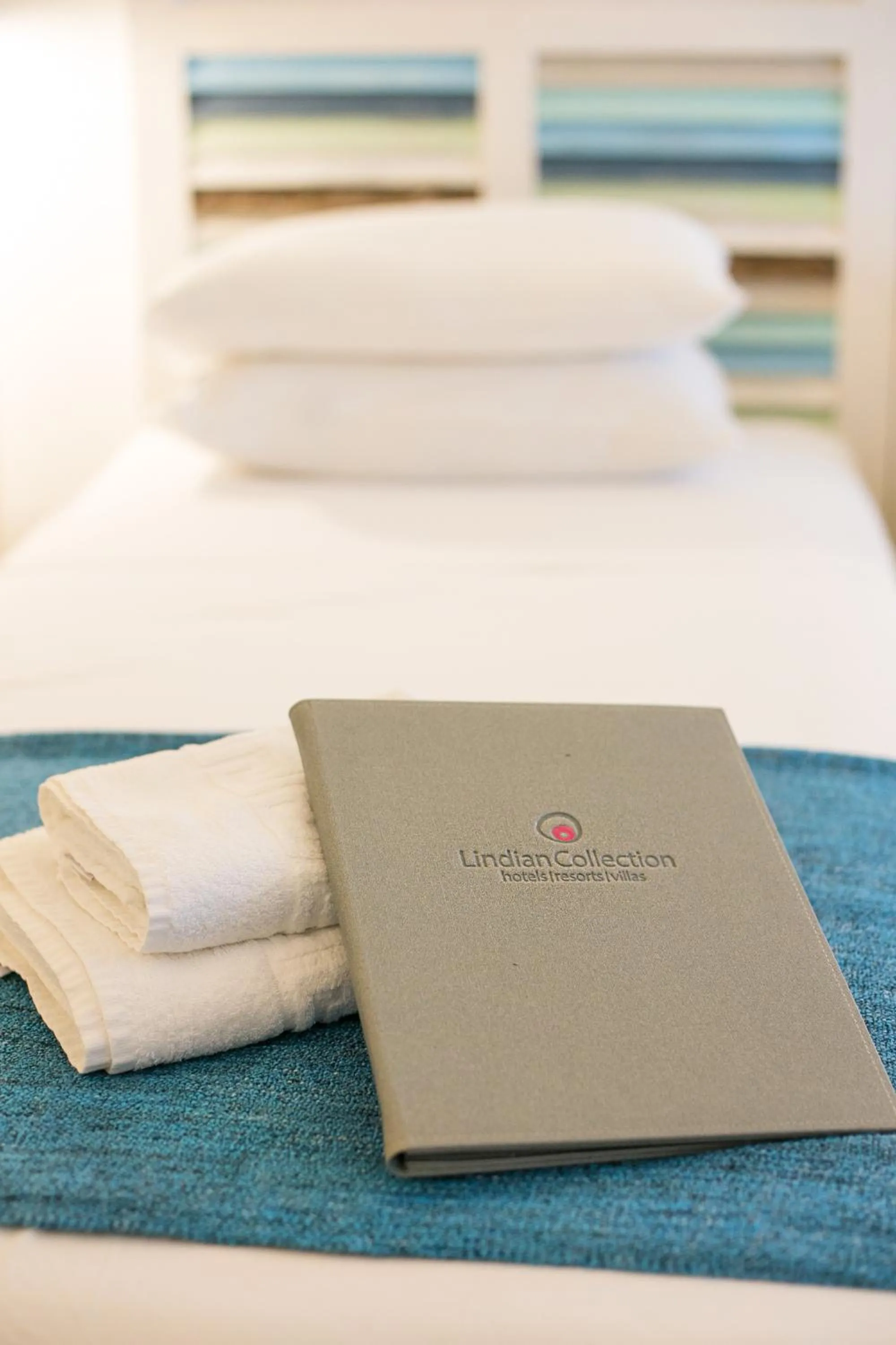 Bed in Thea Villas and Suite