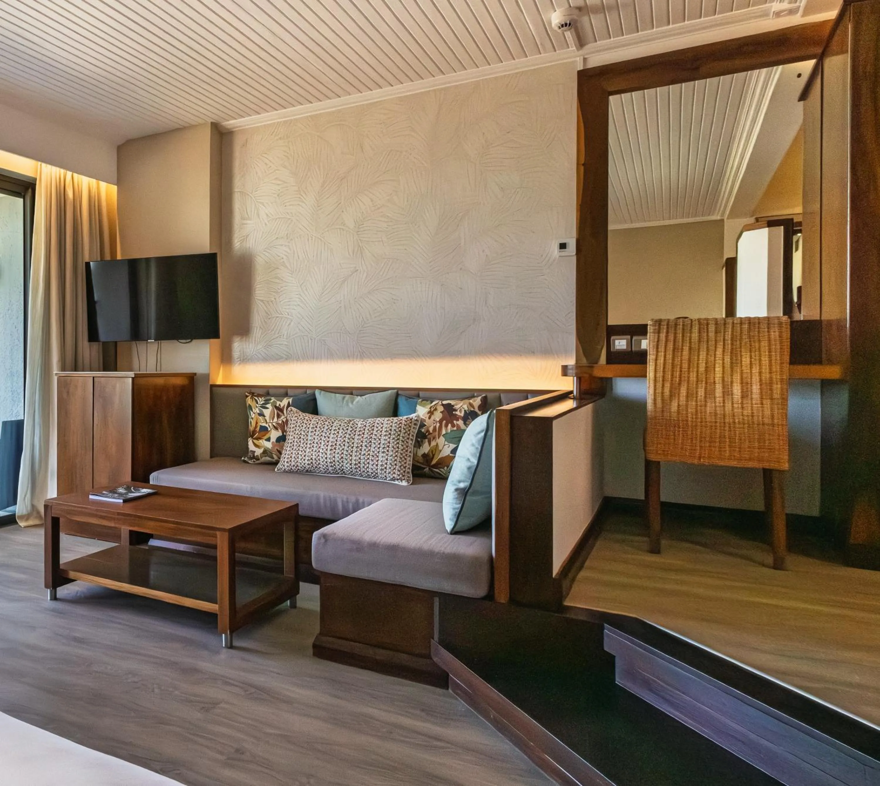 Seating area, Bed in Shandrani Beachcomber Resort & Spa