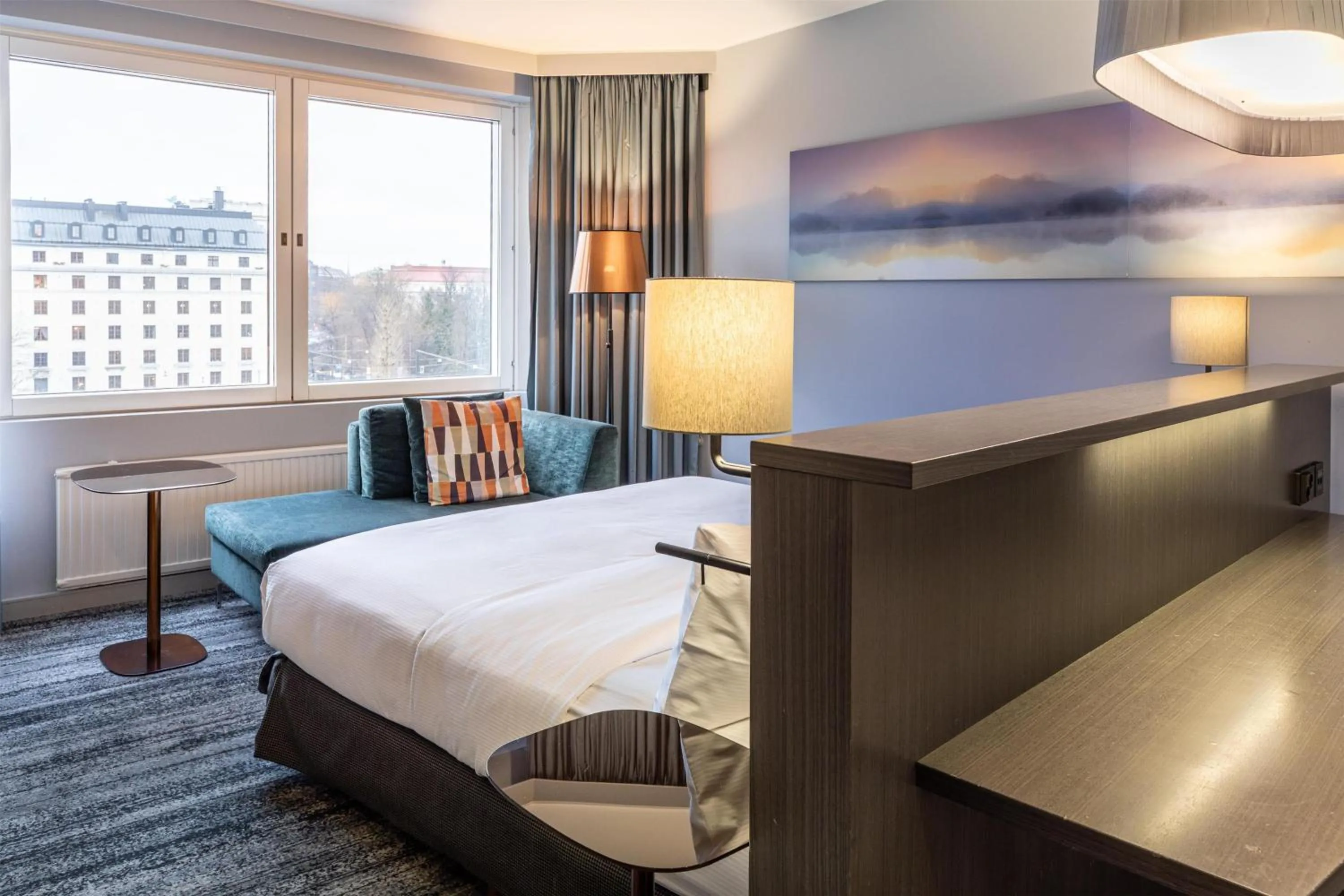 Living room, Bed in Hilton Helsinki Strand