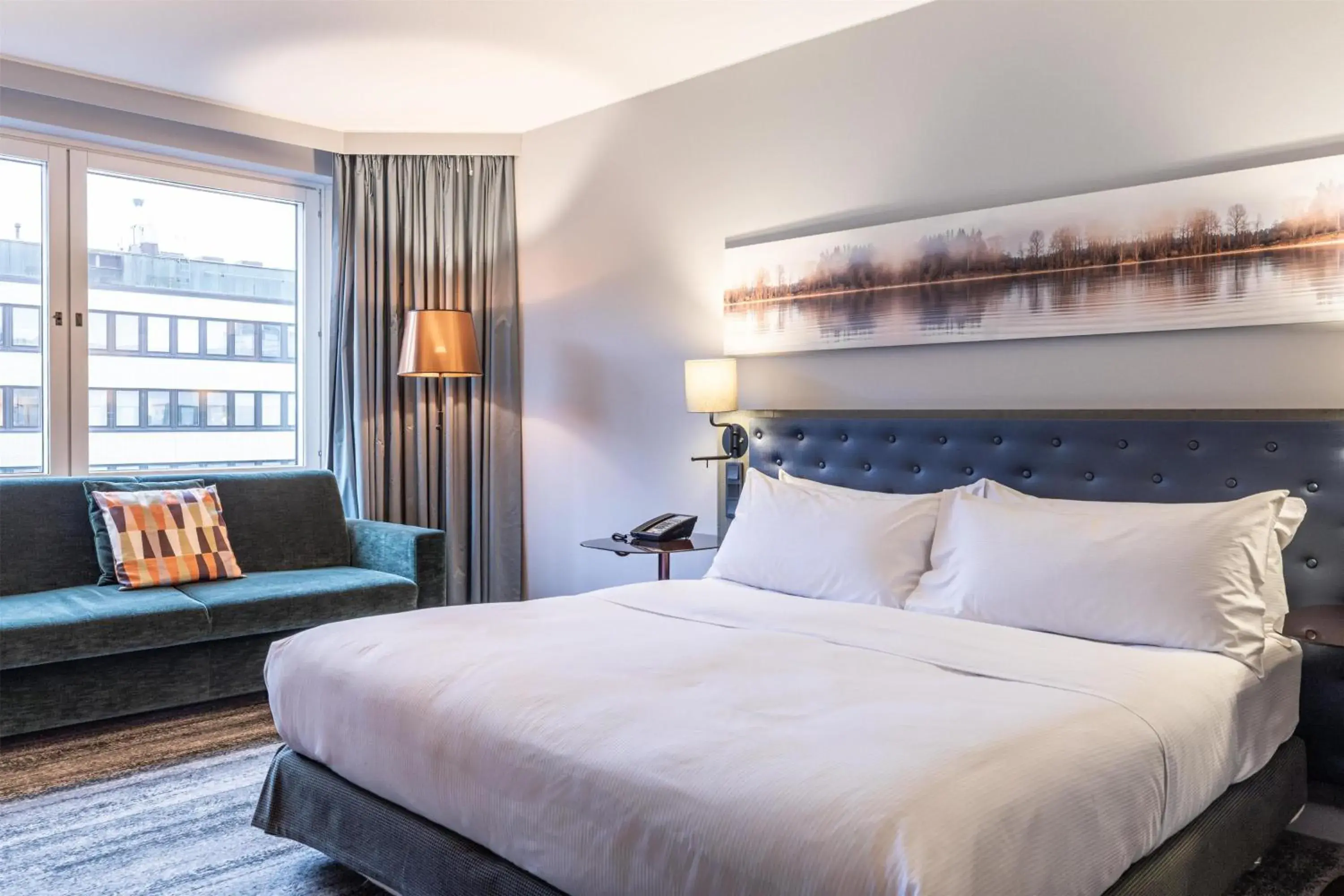 Living room, Bed in Hilton Helsinki Strand Living room, Bed in Hilton Helsinki Strand