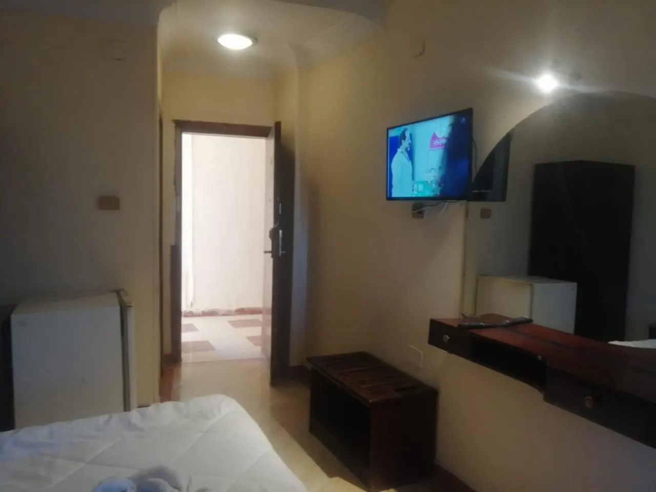 Communal lounge/ TV room, Bed in Eiffel Hotel Hurghada