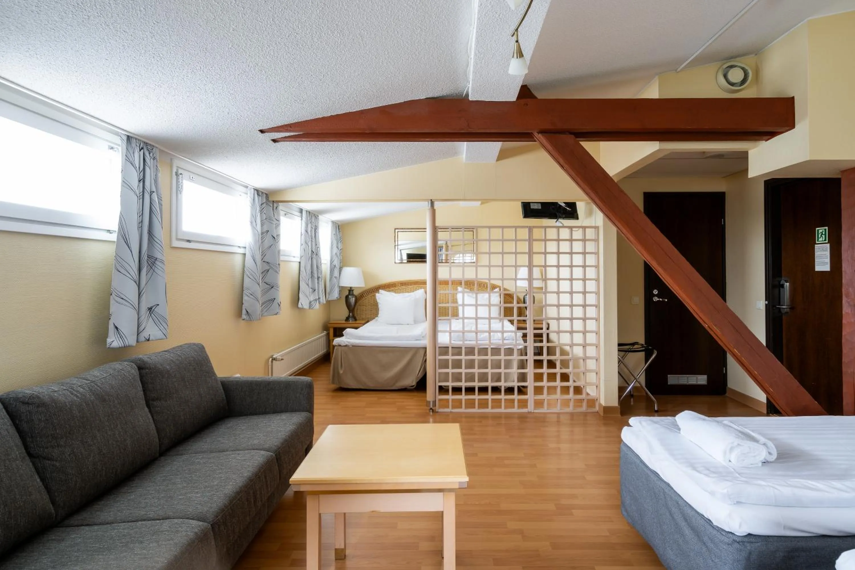 Seating area, Bed in Hiisi Hotel Turku Seaport
