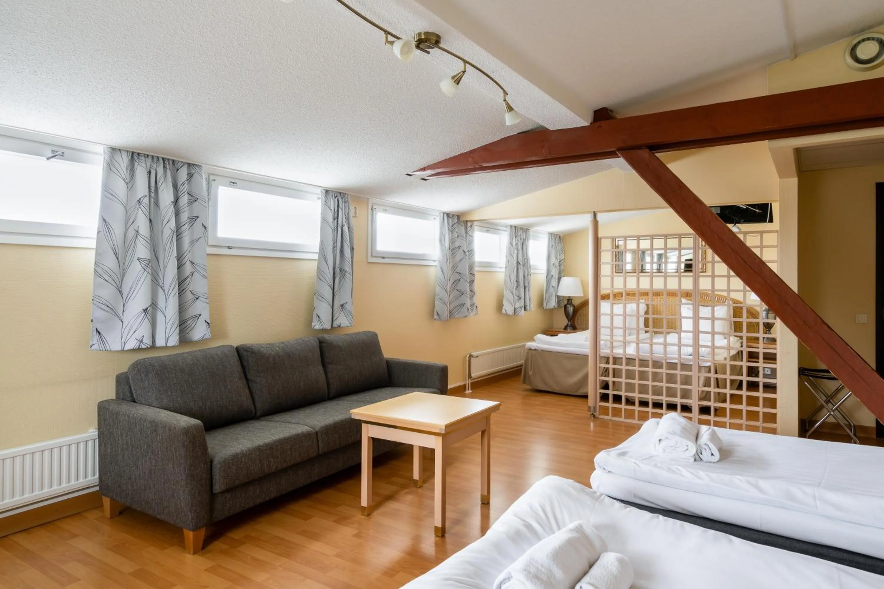 Seating area, Bed in Hiisi Hotel Turku Seaport