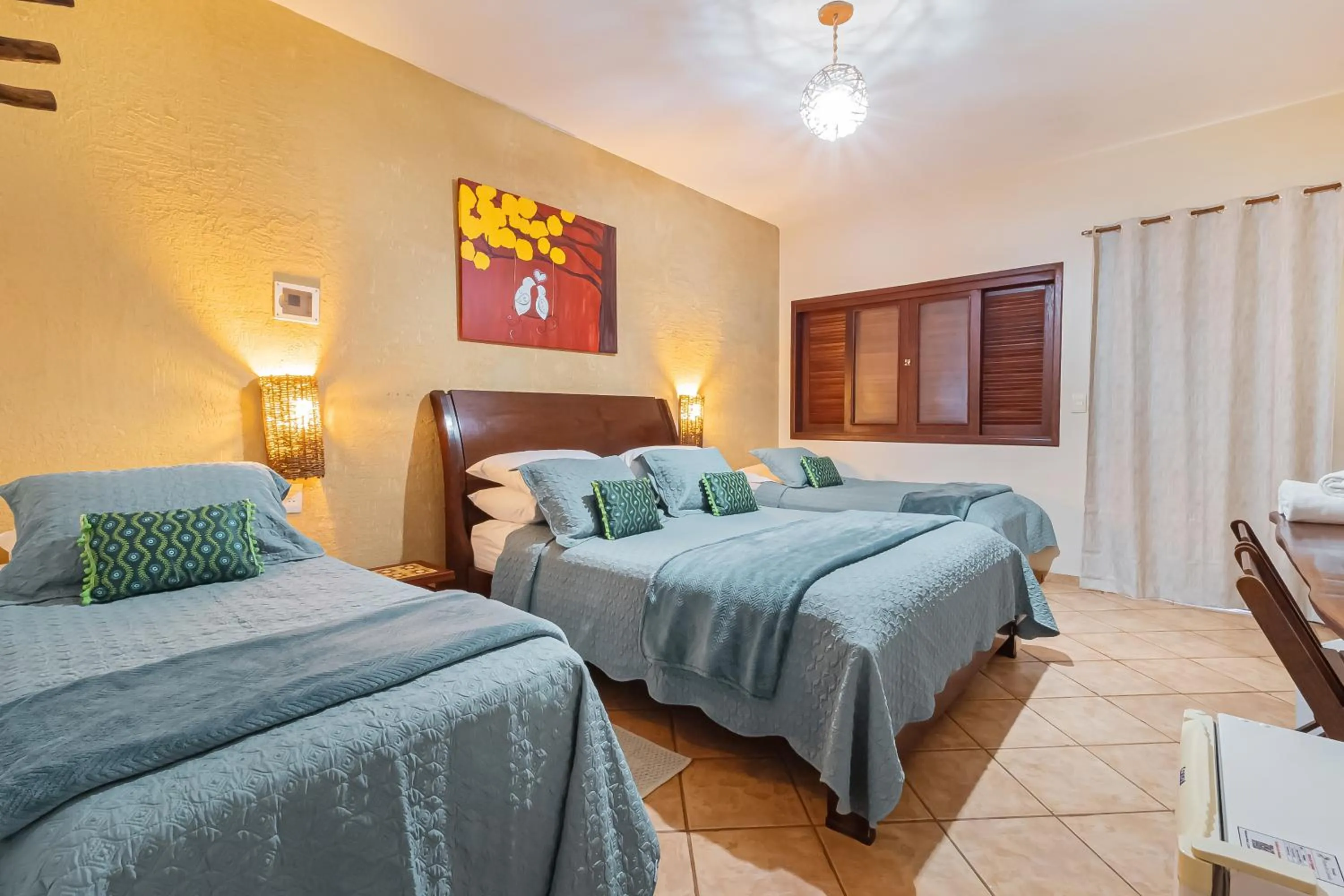 Bed in Pousada Flores do Cerrado